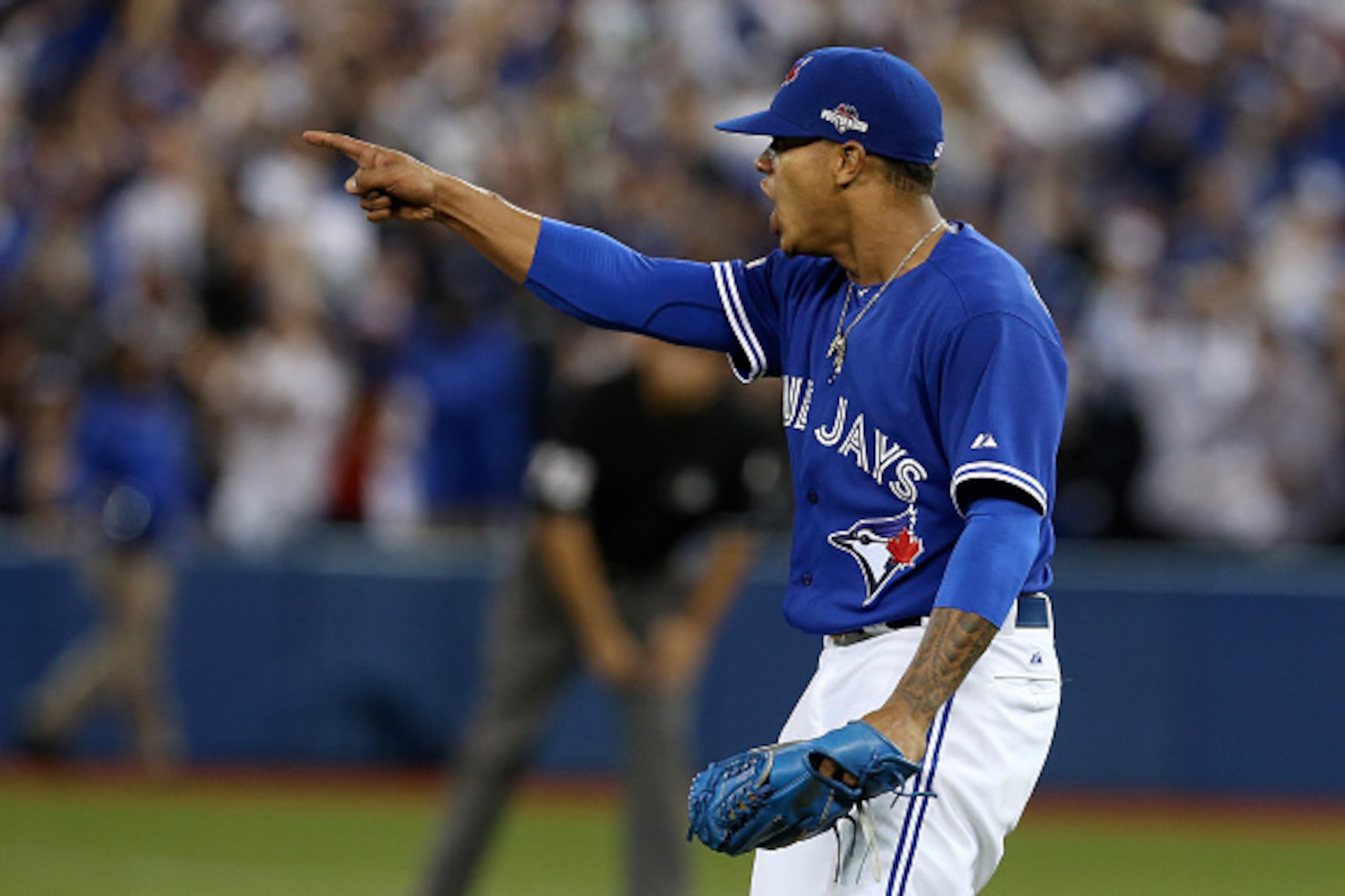 TORONTO, ON - OCTOBER 09:  Marcus Stroman #6 of the Toronto Blue Jays reacts after a play to end the fifth inning against the Texas Rangers during game two of the American League Division Series at Rogers Centre on October 9, 2015 in Toronto, Canada.  (Ph