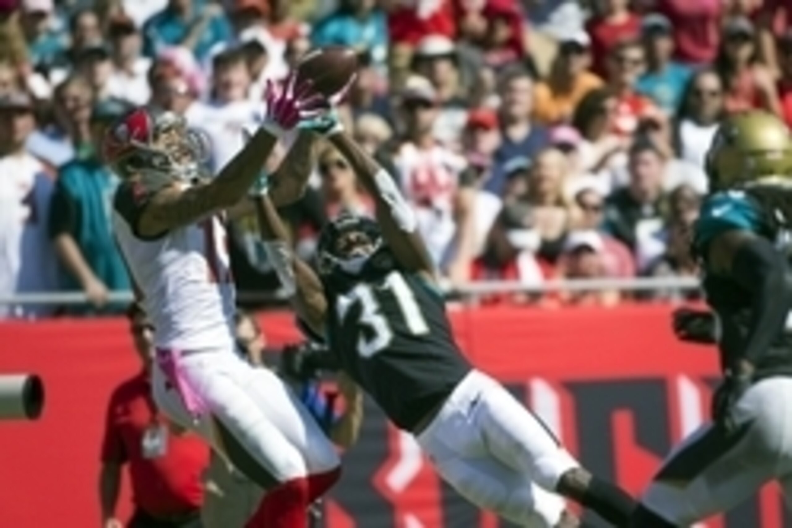 Oct 11, 2015; Tampa, FL, USA; Jacksonville Jaguars cornerback Davon House (31) breaks up a pass intended for Tampa Bay Buccaneers wide receiver Mike Evans (13) in the third quarter at Raymond James Stadium. The Tampa Bay Buccaneers won 38-31. Mandatory Cr