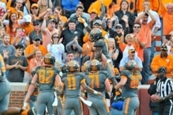 Oct 10, 2015; Knoxville, TN, USA; Tennessee Volunteers running back Alvin Kamara (6) celebrates with teammates after a touchdown against the Georgia Bulldogs during the first half at Neyland Stadium. Mandatory Credit: Jim Brown-USA TODAY Sports