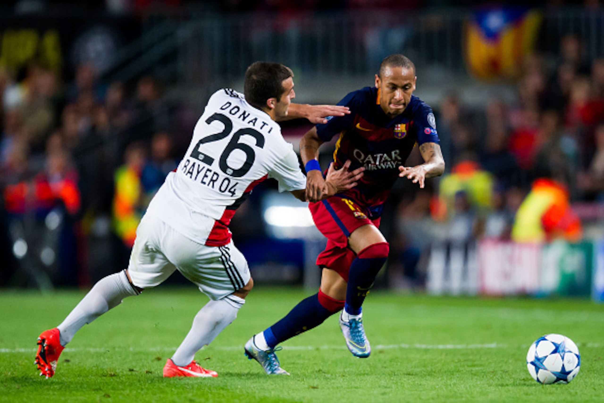 BARCELONA, SPAIN - SEPTEMBER 29:  Neymar Santos Jr of FC Barcelona fights for the ball with Guilio Donati of Bayer 04 Leverkusen during the UEFA Champions League Group E match between FC Barcelona and Bayern 04 Leverkusen at Camp Nou on September 29, 2015