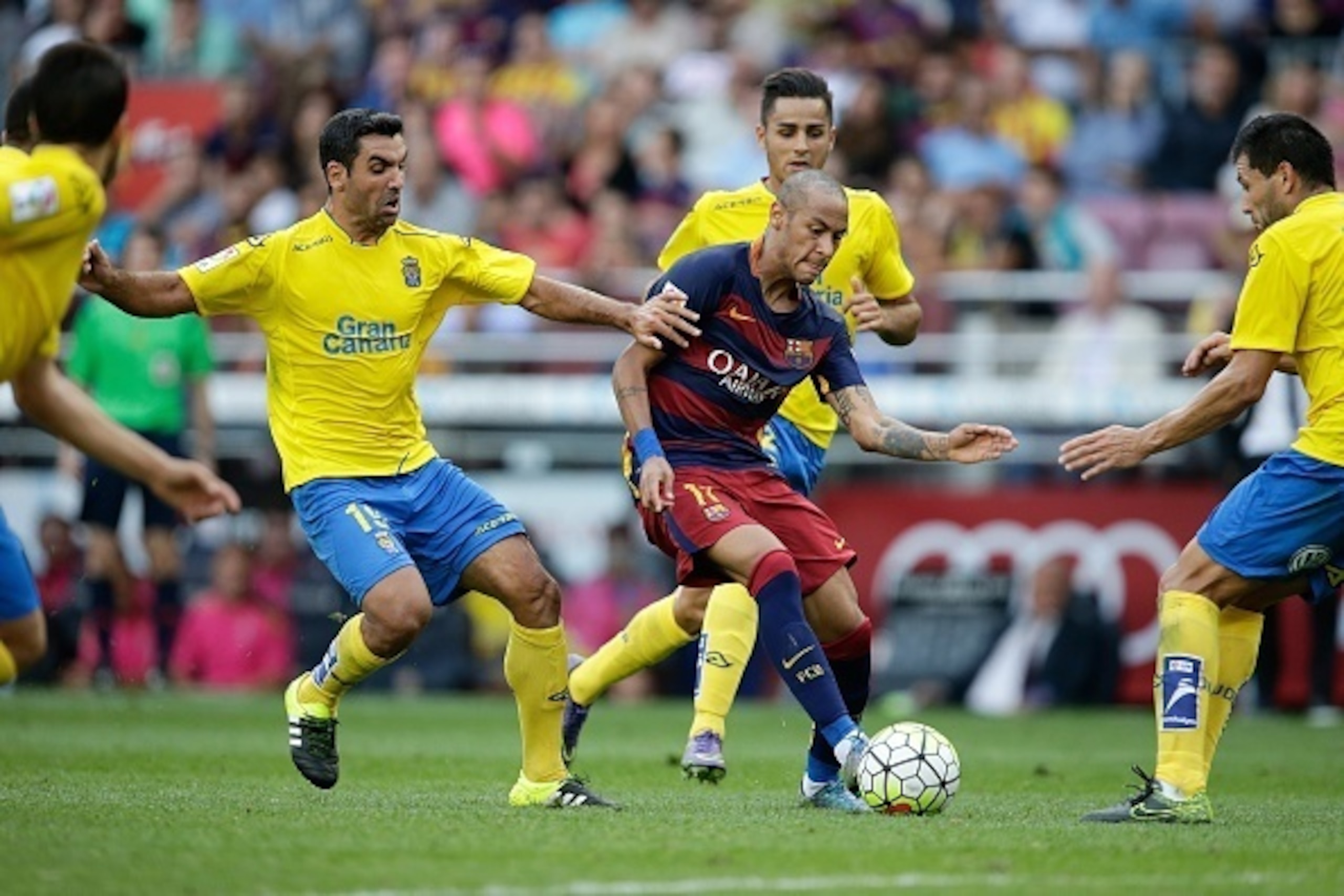 (L-R),Culio of Las Palmas, Neymar Jr of FC Barcelona, Alcaraz of Las Palmas during the Primera Division match between FC Barcelona and Las Palmas on September 26, 2015 at Camp Nou stadium in Barcelona, Spain.(Photo by VI Images via Getty Images)