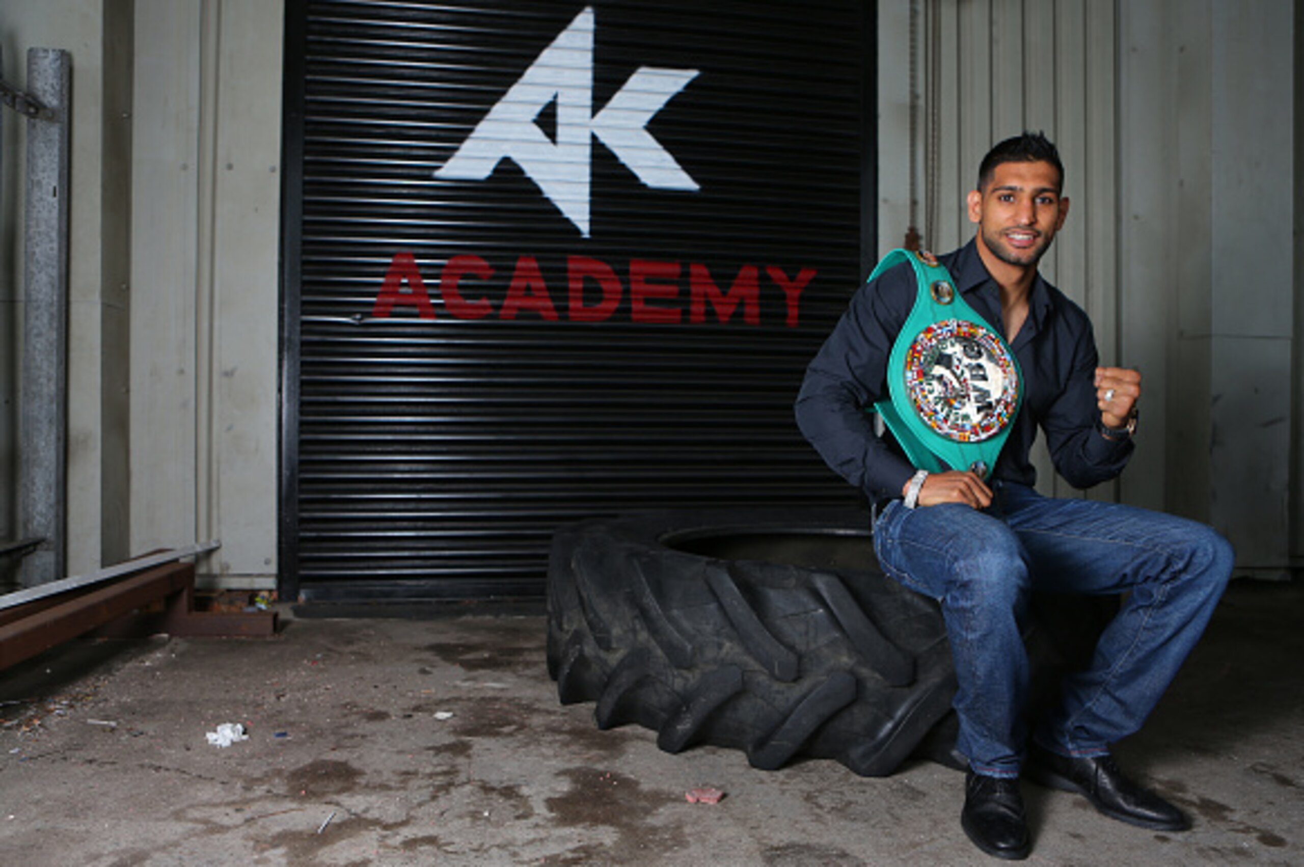 BOLTON, ENGLAND - JUNE 2: Amir Khan poses for photographers during a media day at The Amir Khan Academy on June 2, 2015 in Bolton, England. (Photo by Dave Thompson/Getty Images)