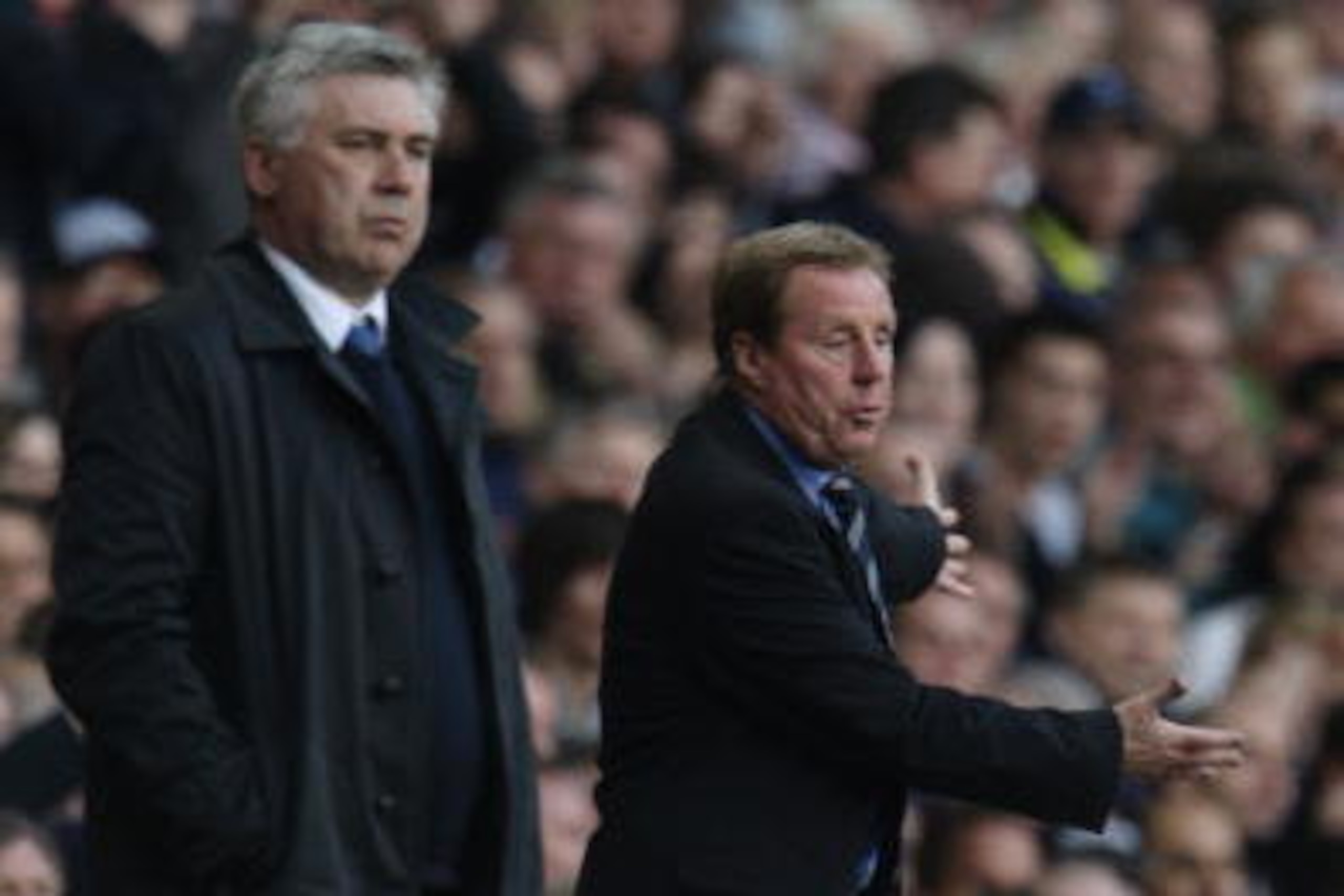 LONDON, ENGLAND - APRIL 17:  Manager of Tottenham Hotspur Harry Redknapp reacts with Chelsea manager Carlo Ancelotti on the touchline during Barclays Premier League match between Tottenham Hotspur and Chelsea at White Hart Lane on April 17, 2010 in London