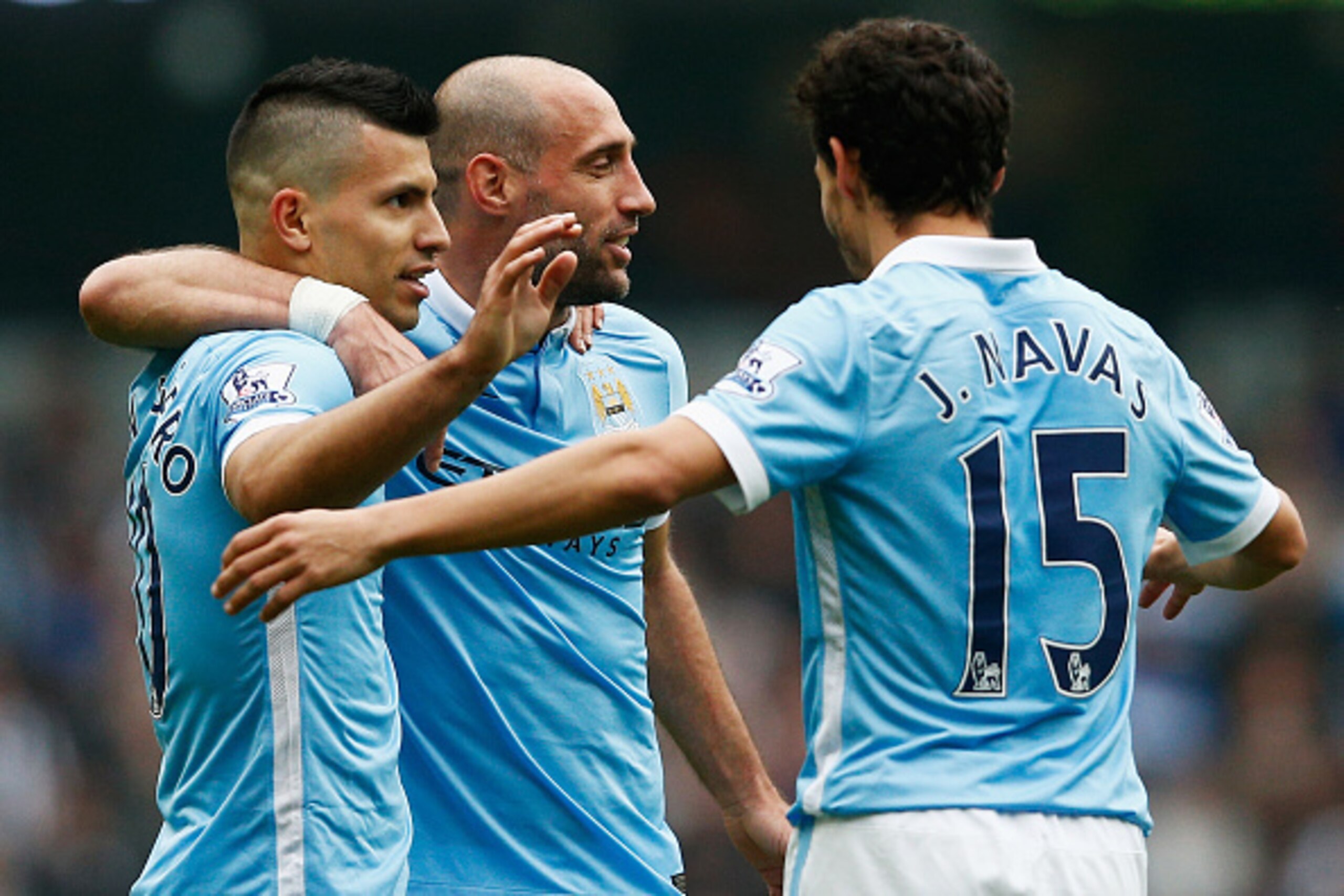 MANCHESTER, ENGLAND - OCTOBER 03: Sergio Aguero of Manchester City celebrates scoring his fourth goal with Jesus Navas and Pablo Zabaleta during the Barclays Premier League match between Manchester City and Newcastle United at Etihad Stadium on October 3 MANCHESTER, ENGLAND - OCTOBER 03: Sergio Aguero of Manchester City celebrates scoring his fourth goal with Jesus Navas and Pablo Zabaleta during the Barclays Premier League match between Manchester City and Newcastle United at Etihad Stadium on October 3