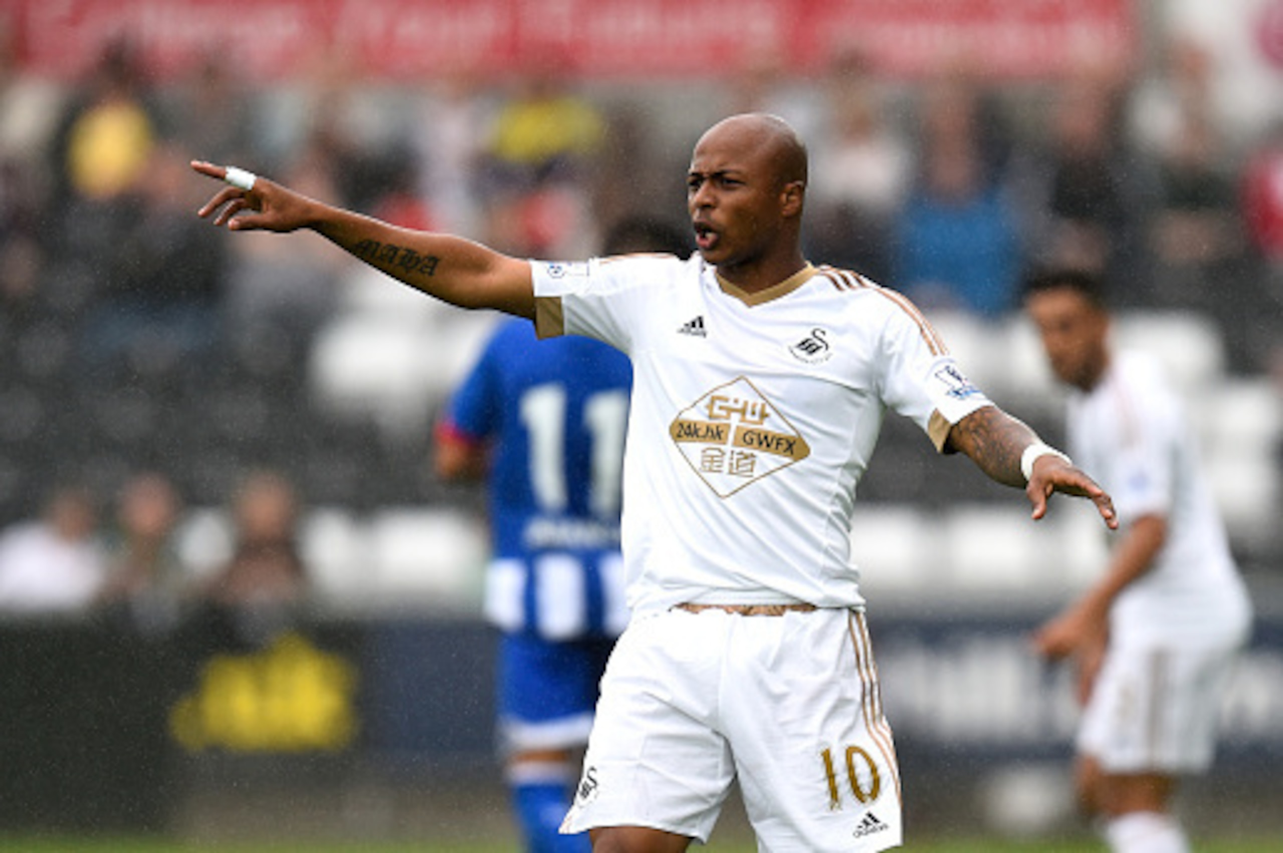 SWANSEA, WALES - AUGUST 01:  Swansea player Andre Ayew in action during the Pre season friendly match between Swansea City and Deportivo La Coruna at Liberty Stadium on August 1, 2015 in Swansea, Wales.  (Photo by Stu Forster/Getty Images)