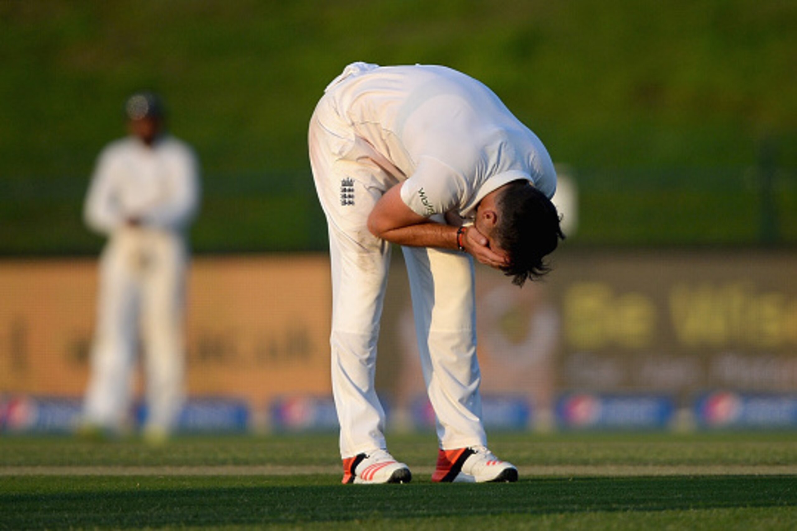 ABU DHABI, UNITED ARAB EMIRATES - OCTOBER 13: James Anderson of England reacts after Ian Bell drops Shoaib Malik of Pakistan during the 1st Test between Pakistan and England at Zayed Cricket Stadium on October 13, 2015 in Abu Dhabi, United Arab Emirates. ABU DHABI, UNITED ARAB EMIRATES - OCTOBER 13: James Anderson of England reacts after Ian Bell drops Shoaib Malik of Pakistan during the 1st Test between Pakistan and England at Zayed Cricket Stadium on October 13, 2015 in Abu Dhabi, United Arab Emirates.