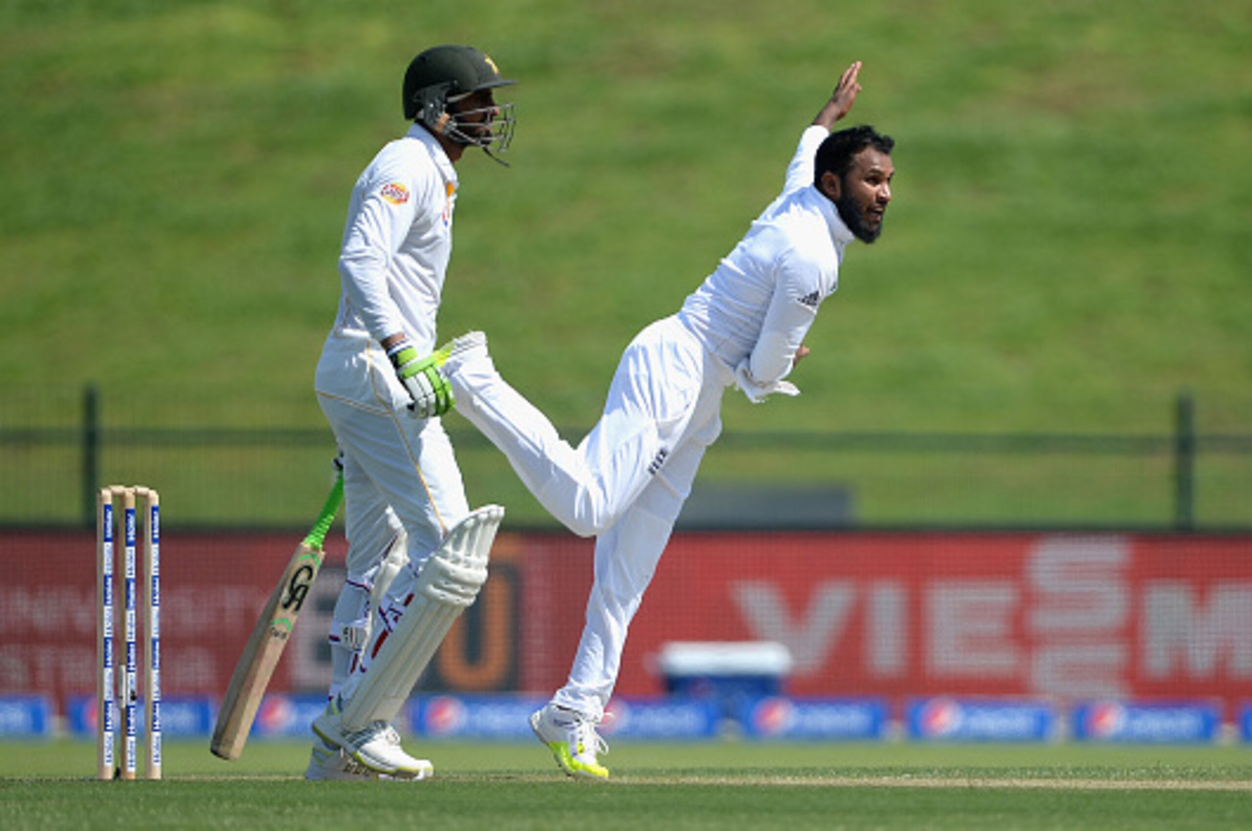 ABU DHABI, UNITED ARAB EMIRATES - OCTOBER 13: Adil Rashid of England bowls during the 1st Test between Pakistan and England at Zayed Cricket Stadium on October 13, 2015 in Abu Dhabi, United Arab Emirates. (Photo by Gareth Copley/Getty Images) ABU DHABI, UNITED ARAB EMIRATES - OCTOBER 13: Adil Rashid of England bowls during the 1st Test between Pakistan and England at Zayed Cricket Stadium on October 13, 2015 in Abu Dhabi, United Arab Emirates. (Photo by Gareth Copley/Getty Images)