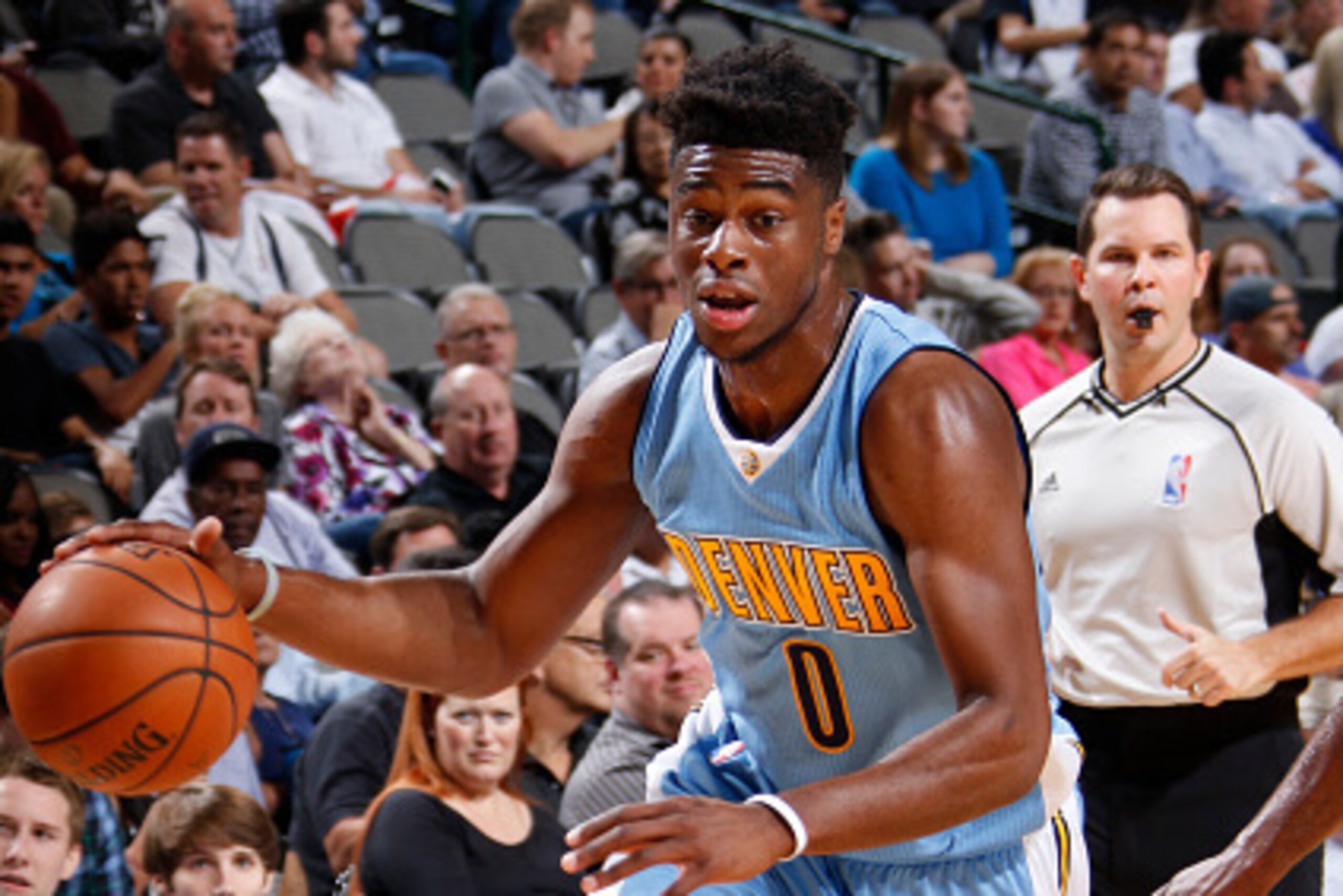 DALLAS, TX - OCTOBER 6:  Emmanuel Mudiay #0 of the Denver Nuggets dribbles the ball against the Dallas Mavericks during a preseason game on October 6, 2015 at the American Airlines Center in Dallas, Texas. NOTE TO USER: User expressly acknowledges and agr