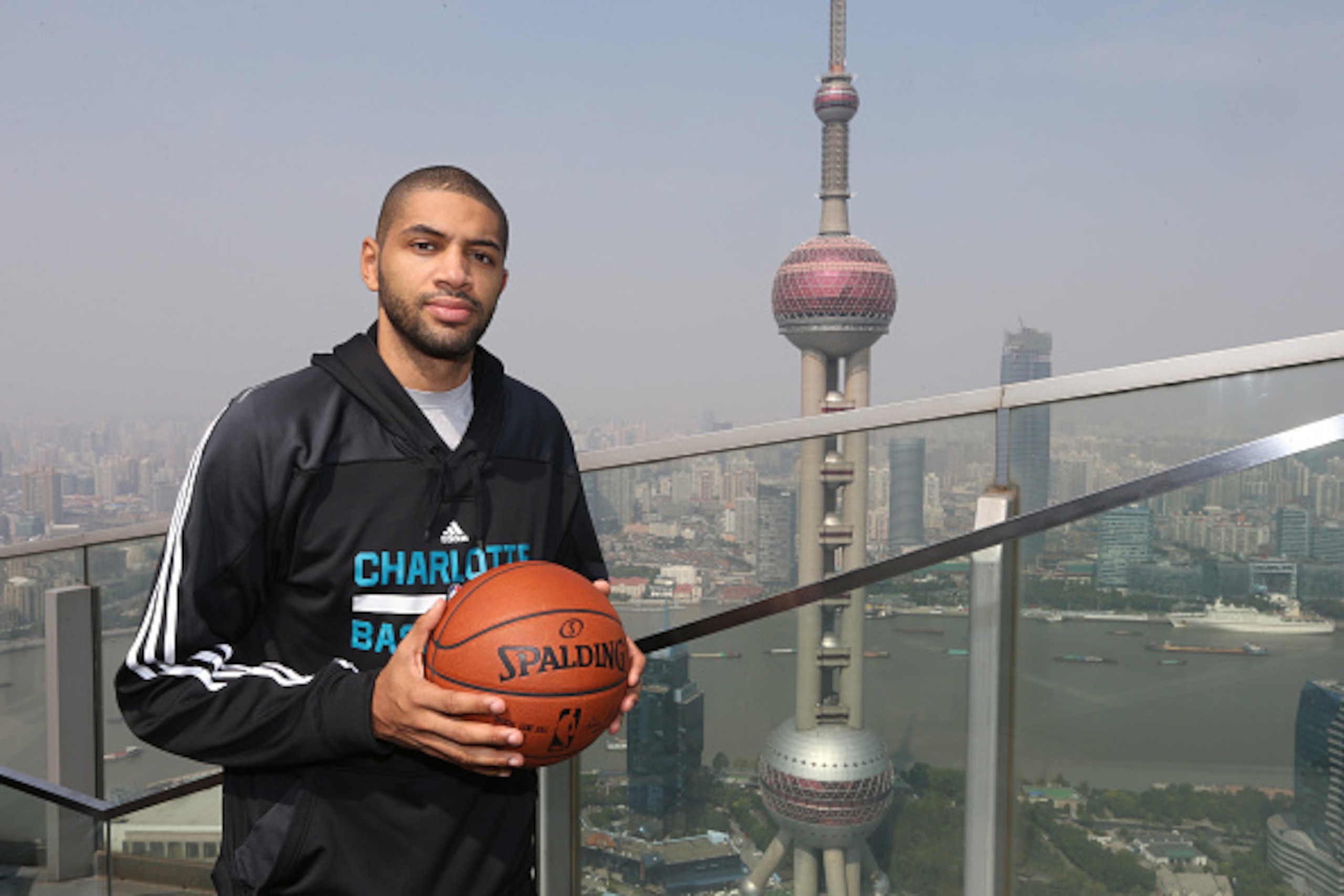 SHANGHAI, CN - OCTOBER 13: Nicolas Batum of the Charlotte Hornets poses for a photo as part of the 2015 NBA Global Games China at the Ritz-Carlton on October 13, 2015 in Shanghai, China. NOTE TO USER: User expressly acknowledges and agrees that, by downlo