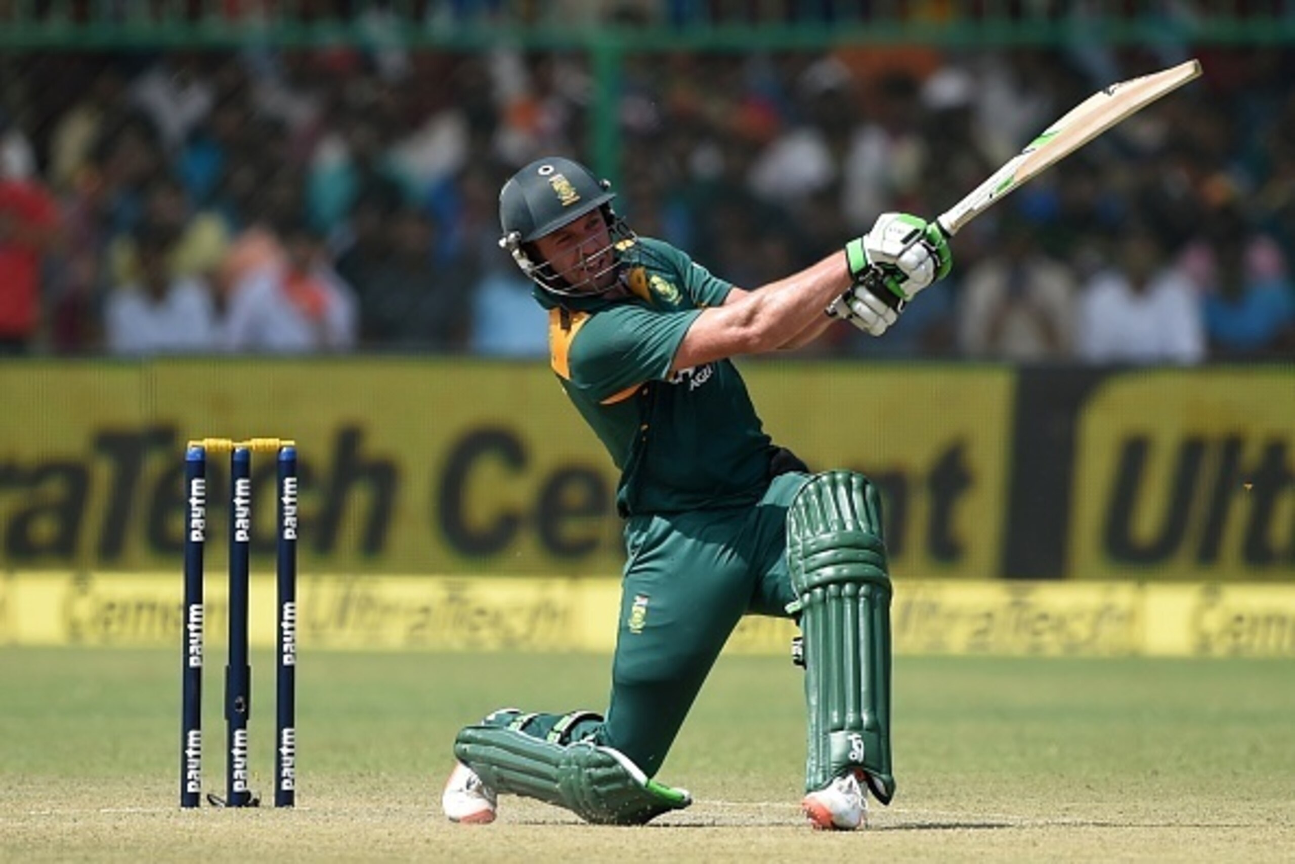 South Africa's captain AB de Villiers plays a shot on his way to scoring a century (100 runs) during the first one day international (ODI) cricket match between India and South Africa at Green Park Stadium in Kanpur on October 11, 2015.  AFP PHOTO / PRAKA