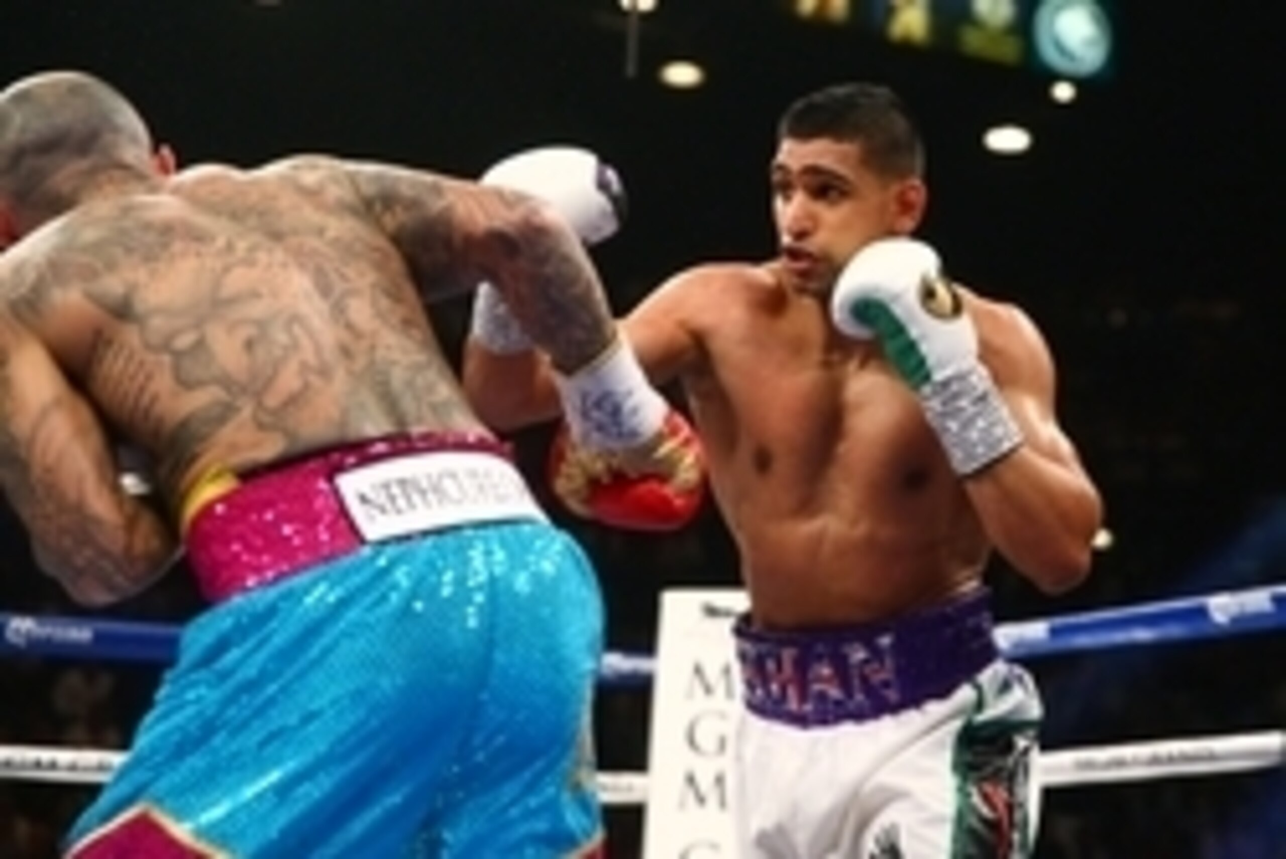 May 3, 2014; Las Vegas, NV, USA; Amir Khan (right) against Luis Collazo during their fight at MGM Grand. Mandatory Credit: Mark J. Rebilas-USA TODAY Sports May 3, 2014; Las Vegas, NV, USA; Amir Khan (right) against Luis Collazo during their fight at MGM Grand. Mandatory Credit: Mark J. Rebilas-USA TODAY Sports