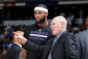 SACRAMENTO, CA - MARCH 16: Head coach George Karl of the Sacramento Kings coaches DeMarcus Cousins #15 against the Atlanta Hawks on March 16, 2015 at Sleep Train Arena in Sacramento, California. NOTE TO USER: User expressly acknowledges and agrees that, b