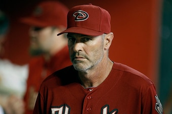 PHOENIX, AZ - SEPTEMBER 14:  Manager Kirk Gibson #23 of the Arizona Diamondbacks looks on during the third inning of a MLB game against the San Diego Padres at Chase Field on September 14, 2014 in Phoenix, Arizona.  (Photo by Ralph Freso/Getty Images)