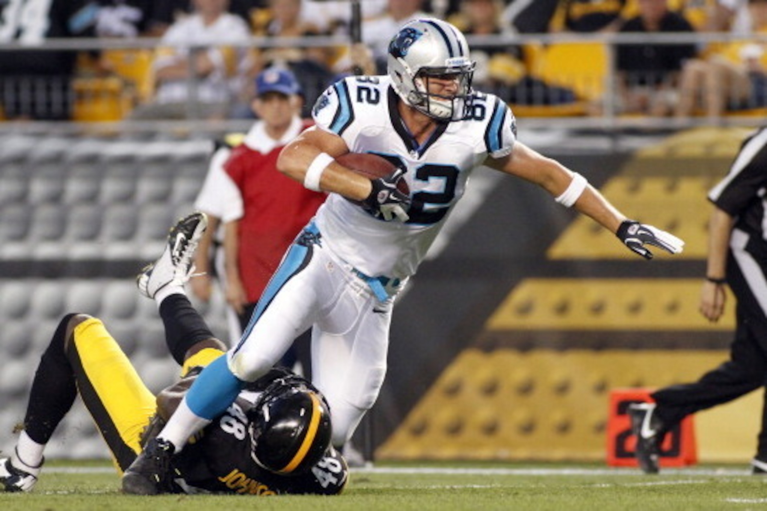 PITTSBURGH, PA - AUGUST 30: Gary Barnidge #82 of the Carolina Panthers runs after the catch against Brandon Johnson #48 of the Pittsburgh Steelers during the preseason game on August 30, 2012 at Heinz Field in Pittsburgh, Pennsylvania. (Photo by Justin PITTSBURGH, PA - AUGUST 30: Gary Barnidge #82 of the Carolina Panthers runs after the catch against Brandon Johnson #48 of the Pittsburgh Steelers during the preseason game on August 30, 2012 at Heinz Field in Pittsburgh, Pennsylvania. (Photo by Justin