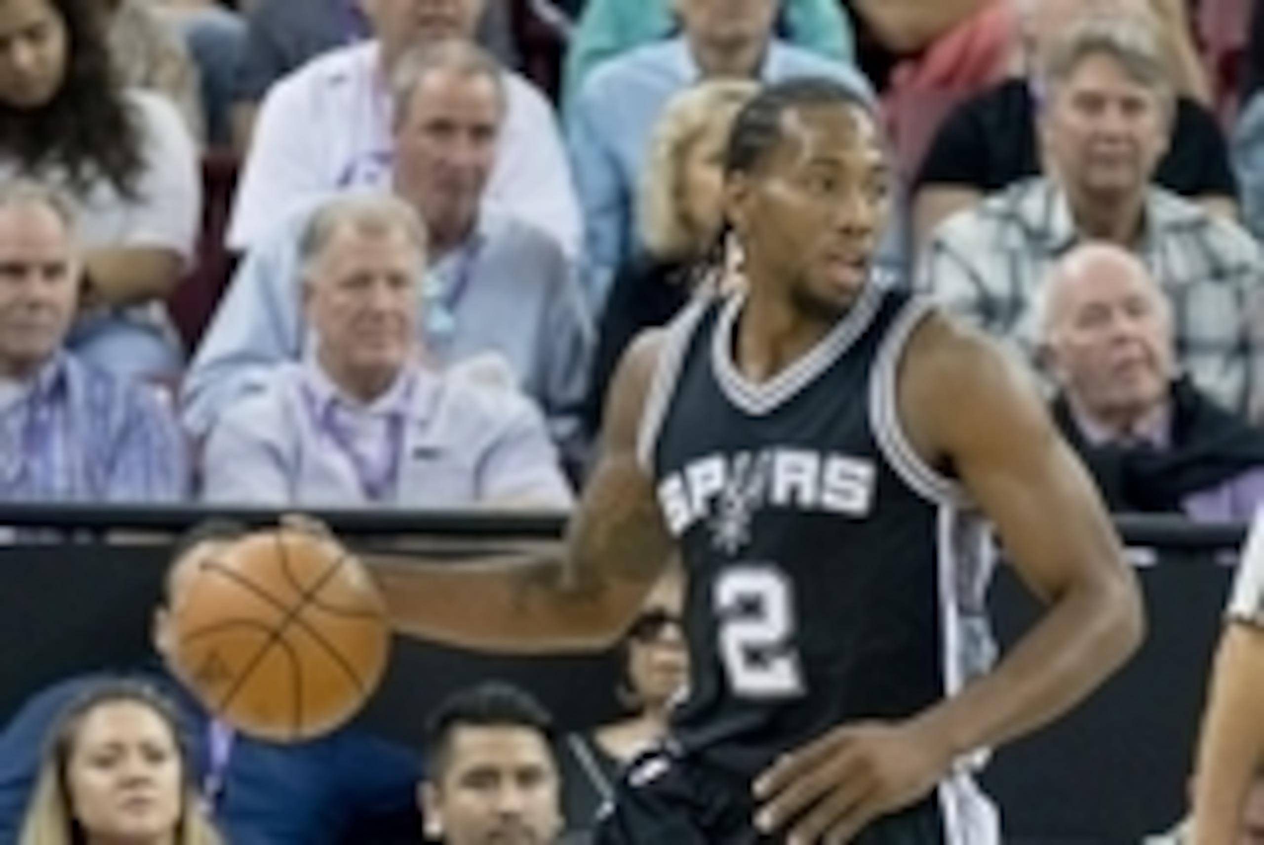 Oct 8, 2015; Sacramento, CA, USA; San Antonio Spurs forward Kawhi Leonard (2) dribbles the ball against the Sacramento Kings during the first quarter at Sleep Train Arena. Mandatory Credit: Kelley L Cox-USA TODAY Sports
