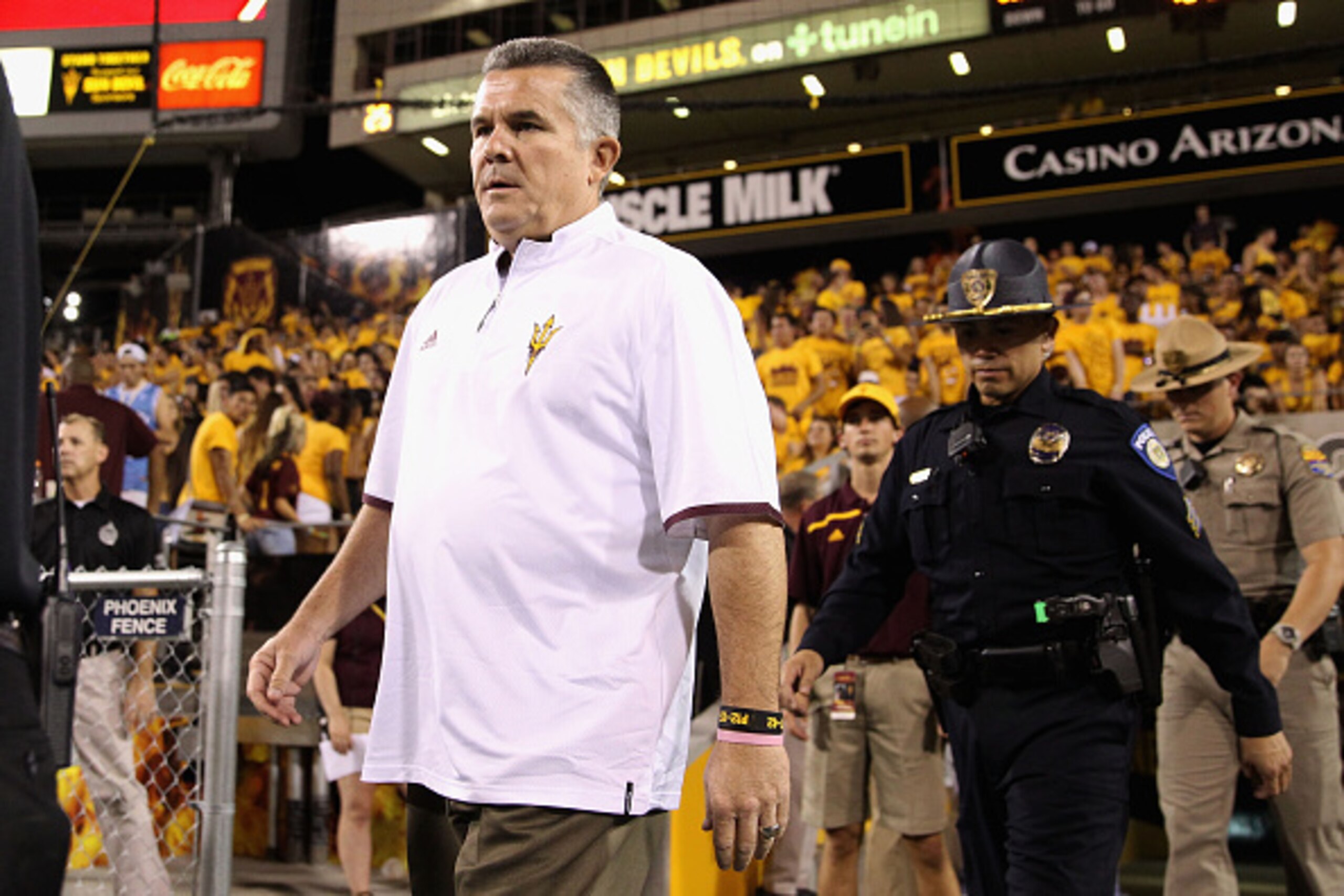 TEMPE, AZ - SEPTEMBER 12:  Head coach Todd Graham of the Arizona State Sun Devils walks onto the field before the college football game against the Cal Poly Mustangs at Sun Devil Stadium on September 12, 2015 in Tempe, Arizona.  (Photo by Christian Peters