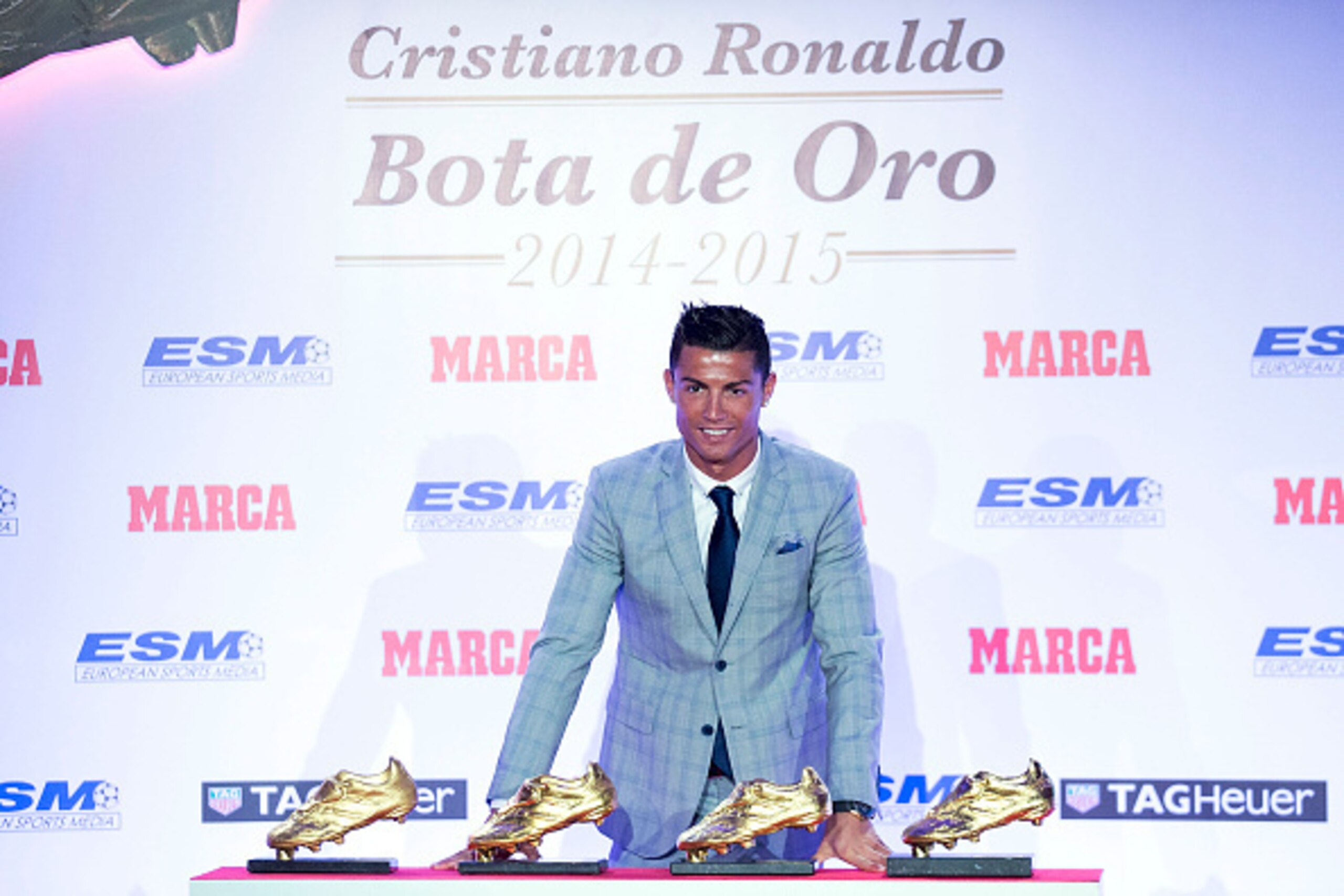 MADRID, SPAIN - OCTOBER 13:  Real Madrid football player Cristiano Ronaldo poses with his four Golden Boot Awards as maximun goal scorer of European leagues at The Westin Palace Hotel on October 13, 2015 in Madrid, Spain.  (Photo by Gonzalo Arroyo Moreno/