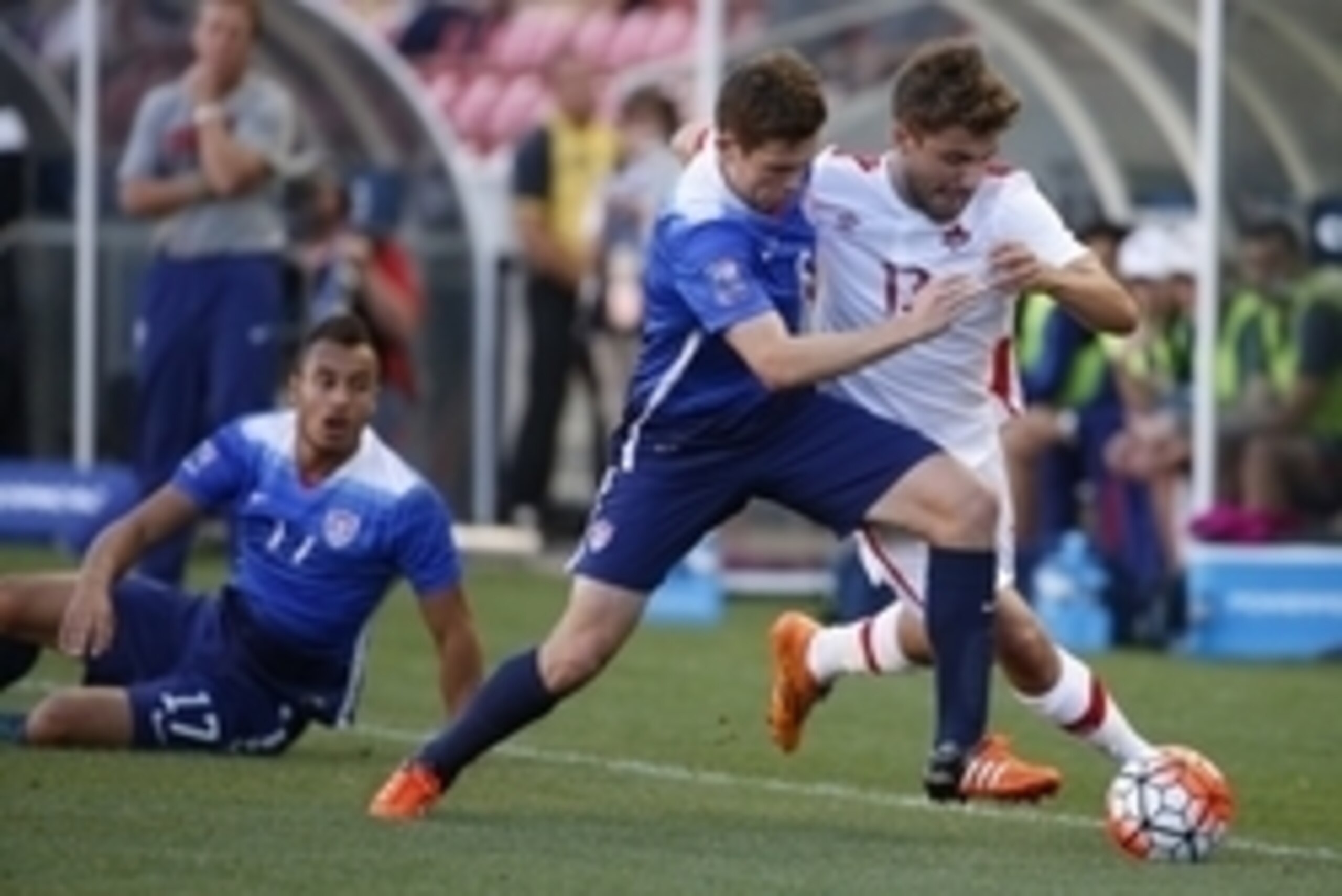 Oct 13, 2015; Sandy, UT, USA; United States midfielder Wil Trapp (6) and Canada forward Michael Petrasso (13) battle for the ball as US forward Jerome Kiesewetter watches in the first half at Rio Tinto Stadium. Mandatory Credit: Jeff Swinger-USA TODAY Spo