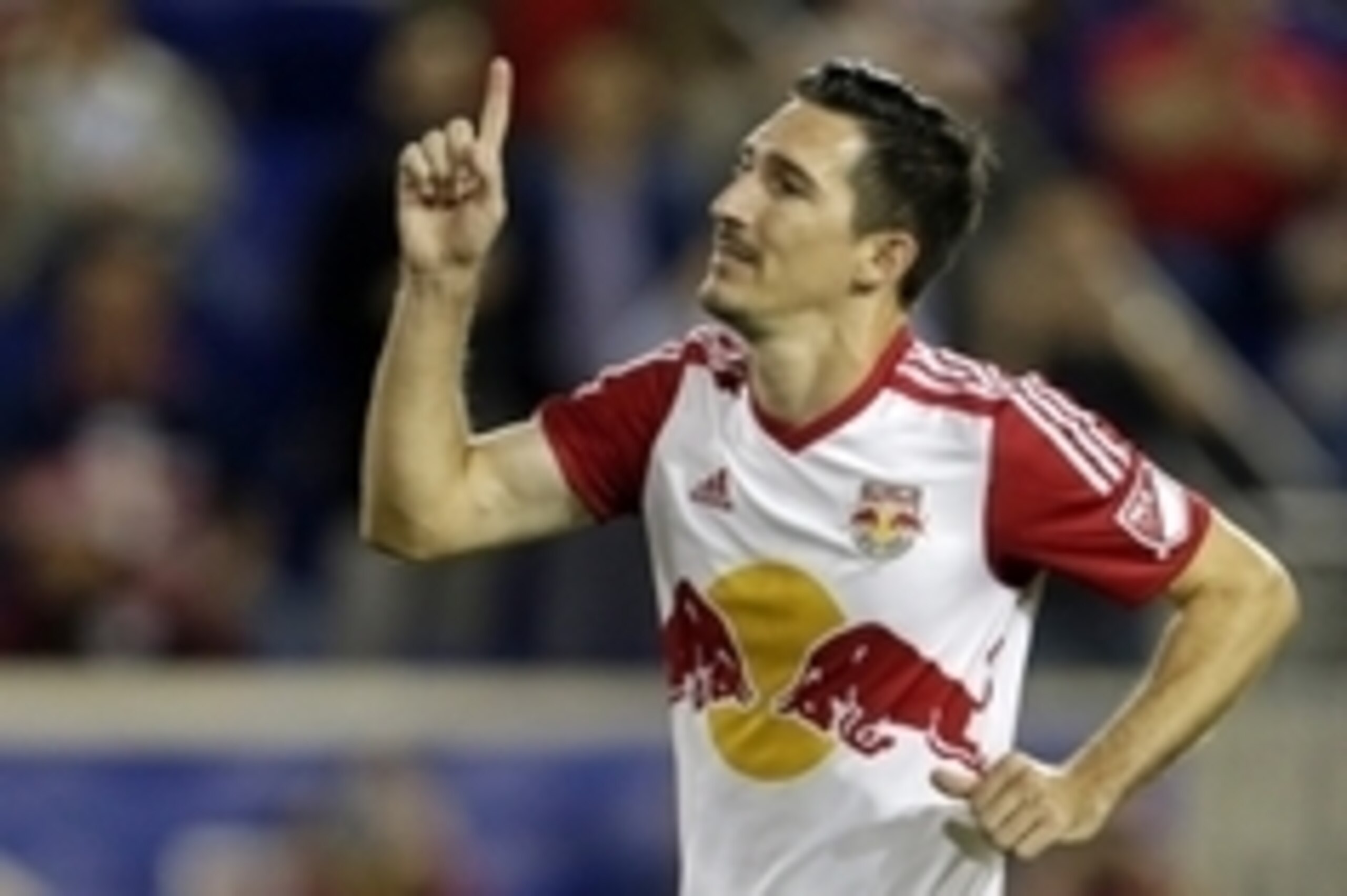 Oct 7, 2015; Harrison, NJ, USA; New York Red Bulls midfielder Sacha Kljestan (16) celebrates after scoring a penalty kick goal against the Montreal Impact during the first half of a soccer game at Red Bull Arena. Mandatory Credit: Adam Hunger-USA TODAY Sp