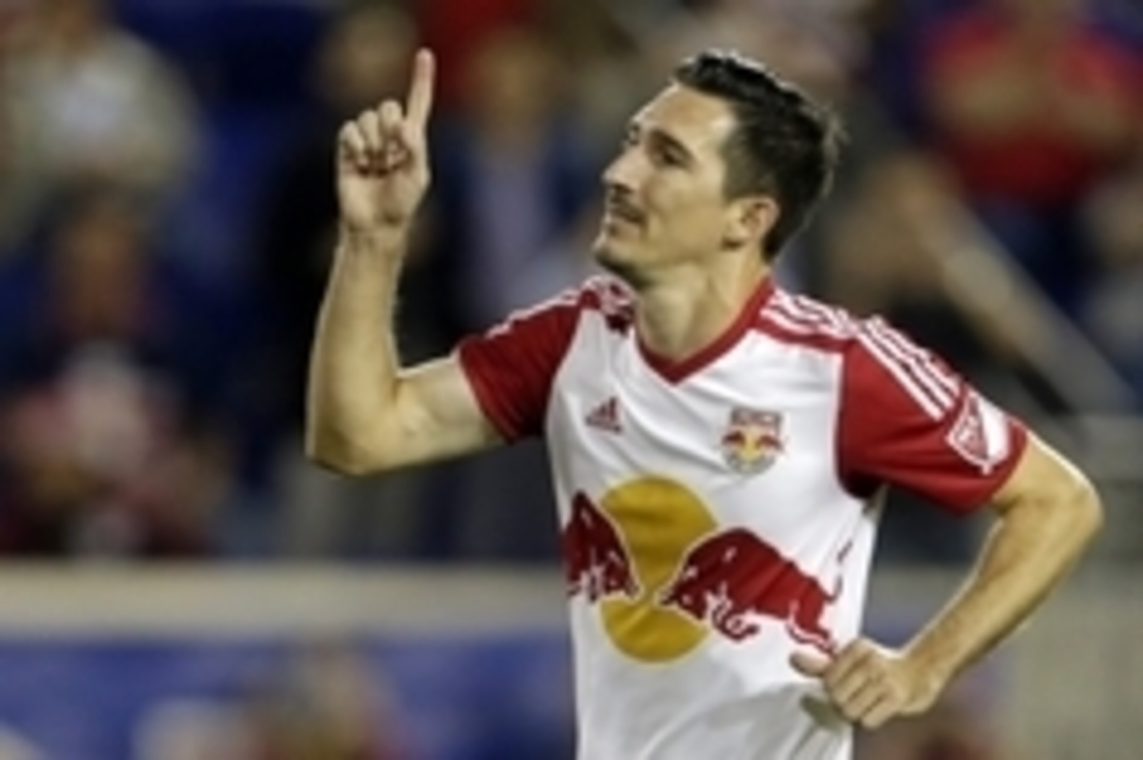 Oct 7, 2015; Harrison, NJ, USA; New York Red Bulls midfielder Sacha Kljestan (16) celebrates after scoring a penalty kick goal against the Montreal Impact during the first half of a soccer game at Red Bull Arena. Mandatory Credit: Adam Hunger-USA TODAY Sp