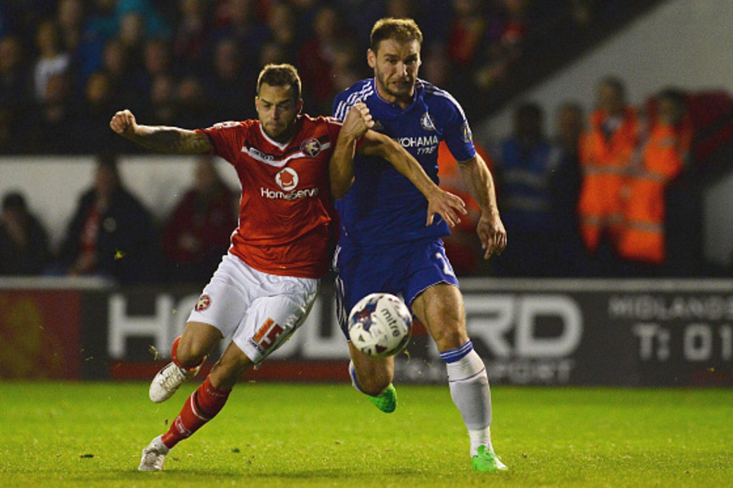 WALSALL, ENGLAND - SEPTEMBER 23:  Milan Lalkovic of Walsall and Branislav Ivanovic of Chelsea battle for the ball during the Capital One Cup third round match between Walsall and Chelsea at Banks's Stadium on September 23, 2015 in Walsall, England.  (Phot