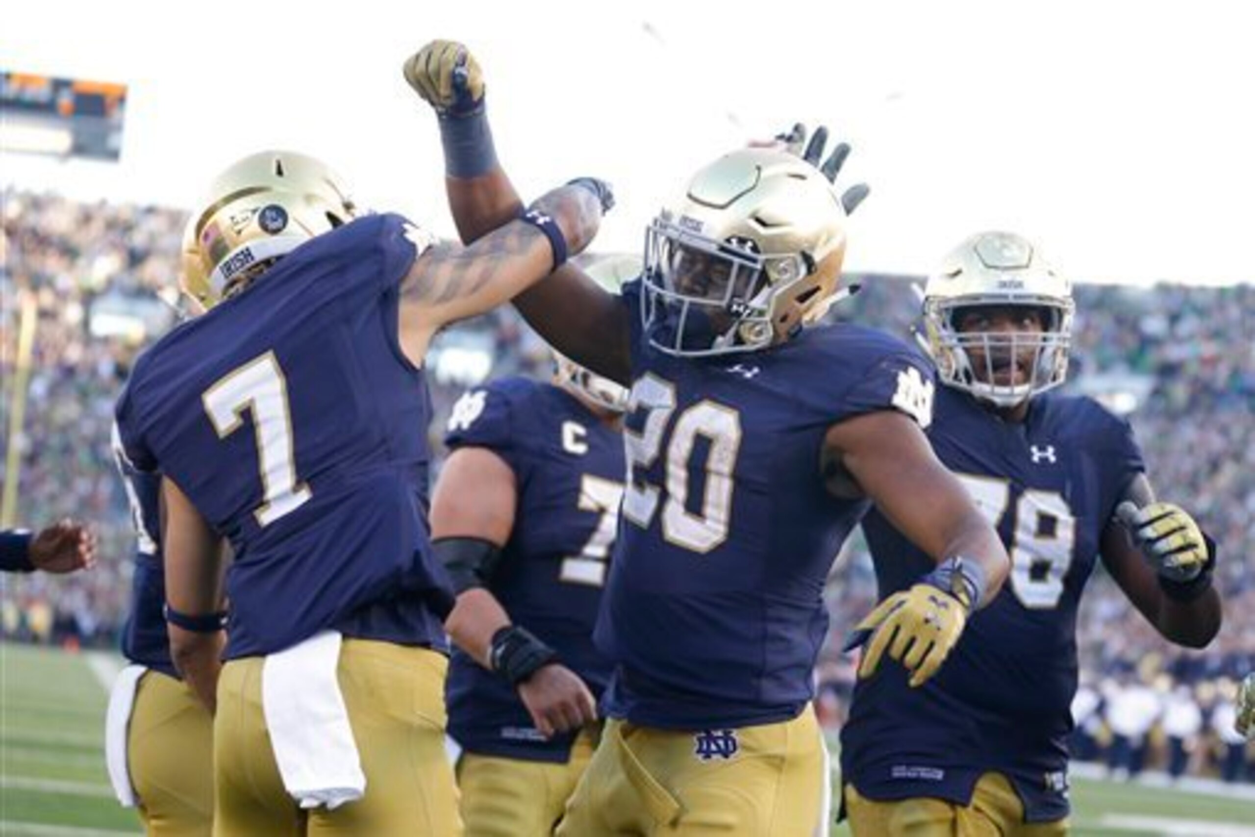 Will Fuller and C.J. Prosise celebrate a touchdown against Georgia Tech.