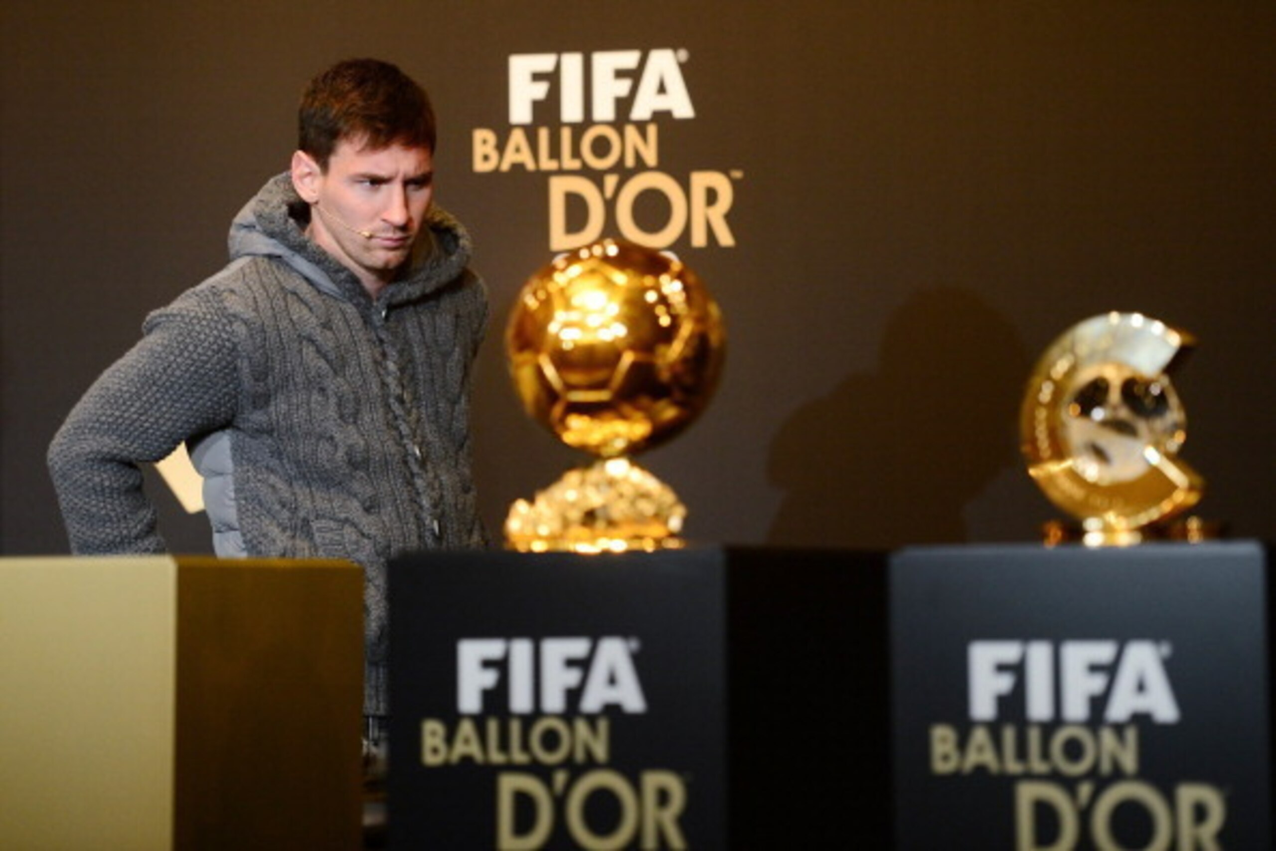 Argentina's Lionel Messi arrives for a press conference on January 7, 2013 at the Kongresshaus, ahead of the Fifa Ballon d'Or football award ceremony in Zurich.  AFP PHOTO / OLIVIER MORIN        (Photo credit should read OLIVIER MORIN/AFP/Getty Images)