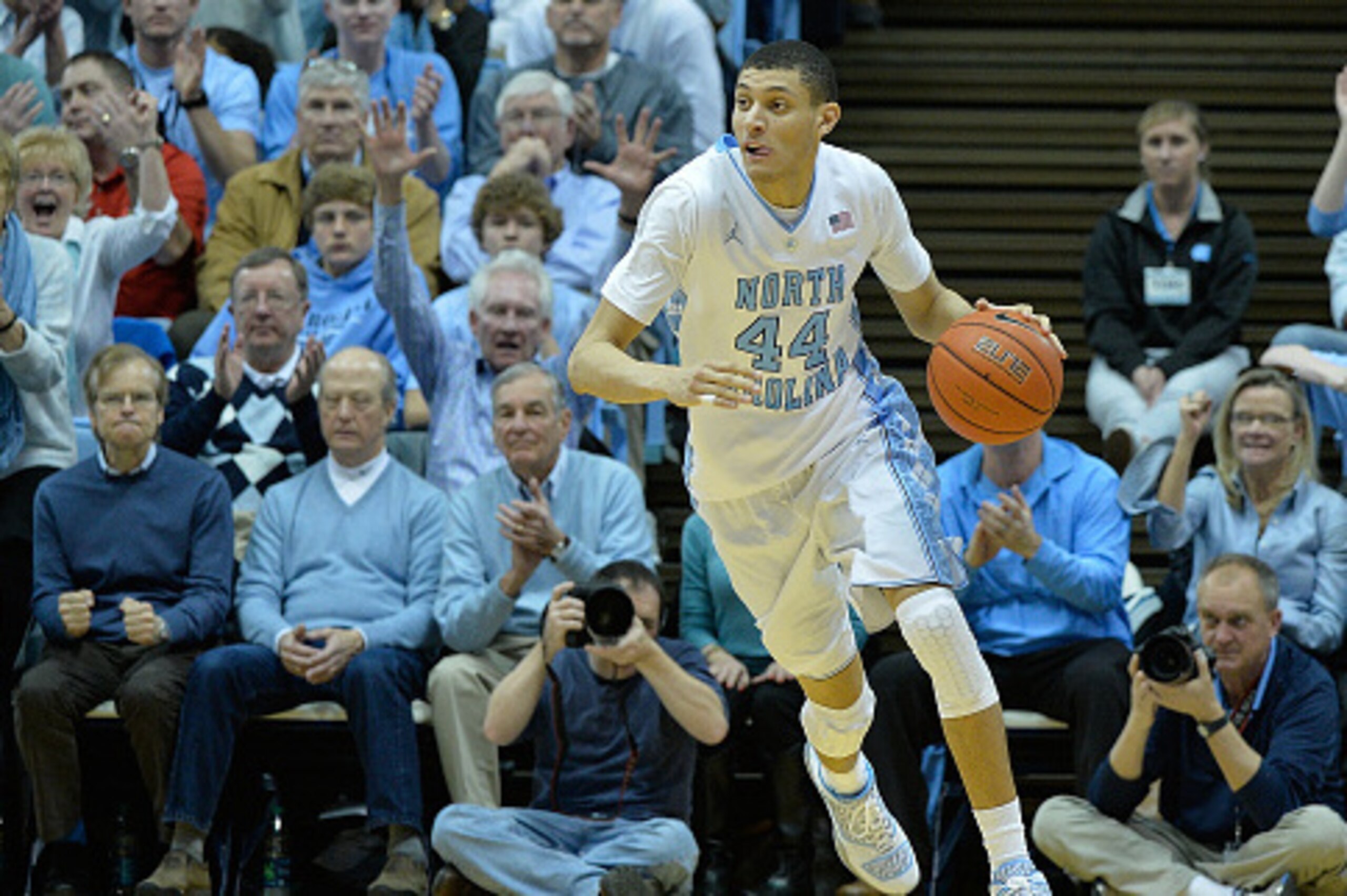 CHAPEL HILL, NC - JANUARY 10:  Justin Jackson #44 of the North Carolina Tar Heels moves the ball against the Louisville Cardinals during their game at the Dean Smith Center on January 10, 2015 in Chapel Hill, North Carolina. North Carolina won 72-71.  (Ph