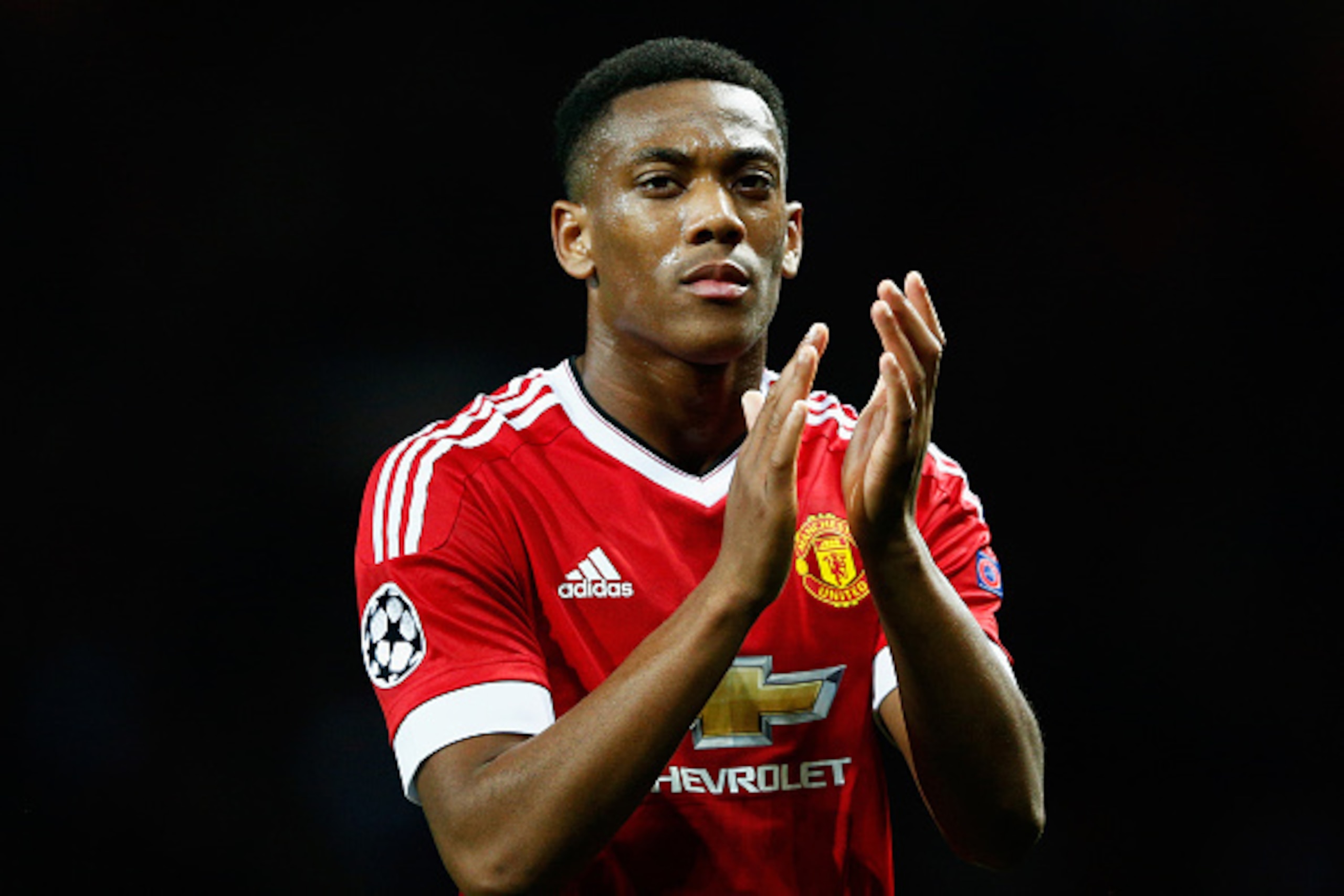 MANCHESTER, ENGLAND - SEPTEMBER 30:  Anthony Martial of Manchester United applauds the crowd after victory in the UEFA Champions League Group B match between Manchester United FC and VfL Wolfsburg at Old Trafford on September 30, 2015 in Manchester, Unite