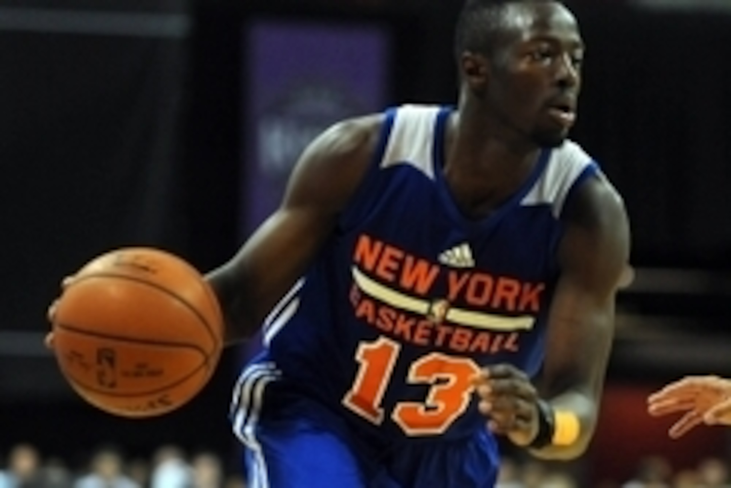Jul 14, 2015; Las Vegas, NV, USA; New York Knicks guard Jerian Grant (13) dribbles the ball during an NBA Summer League game against the 76ers at Thomas & Mack Center. The Knicks won the game in overtime, 84-81. Mandatory Credit: Stephen R. Sylvanie-USA T