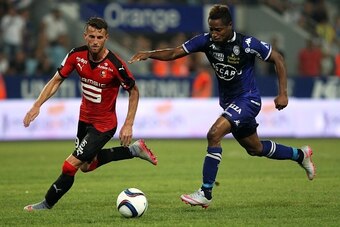 Bastia's Guinean forward Francois Kamano (R) vies with Rennes' Albanian defender Ermir Lenjani during the French L1 football match Bastia (SCB) against Rennes (SRFC) on August 8, 2015 in the Armand Cesari stadium in Bastia, on the French Mediterranean isl