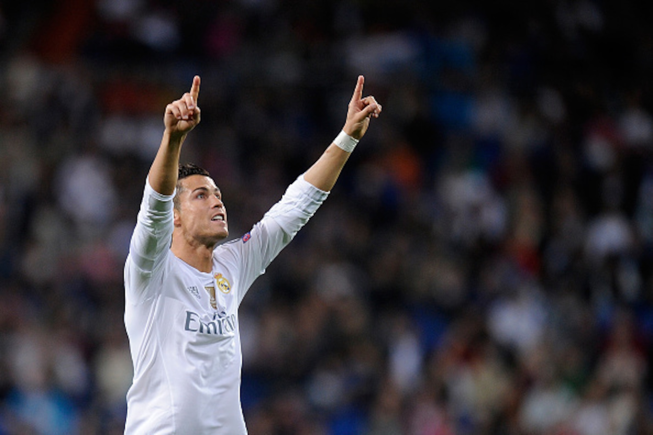 MADRID, SPAIN - SEPTEMBER 15:  Cristiano Ronaldo of Real Madrid celebrates after scoring Real's 3rd goal from the penalty spot during the UEFA Champions League Group A match between Real Madrid and Shakhtar Donetsk at estadio Santiago Bernabeu on Septembe