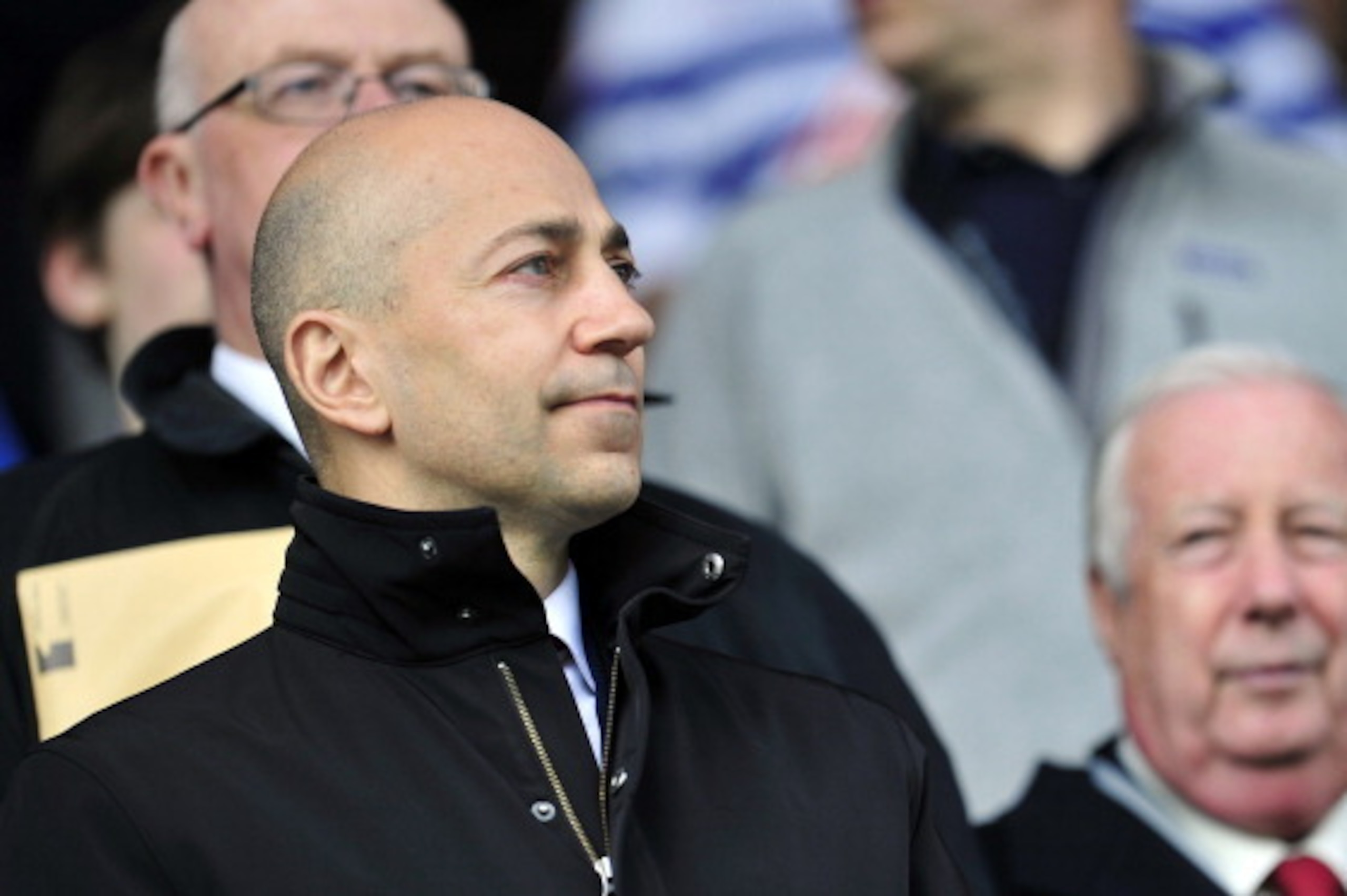 Arsenal's Greek - South African Chief Executive Ivan Gazidis looks on before the English Premier League football match between Queens Park Rangers and Arsenal at Loftus Road in London on May 4, 2013. AFP PHOTO / GLYN KIRK 

RESTRICTED TO EDITORIAL USE. No