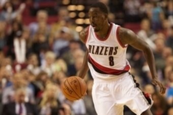 Oct 8, 2015; Portland, OR, USA;  Portland Trail Blazers forward Al-Farouq Aminu (8) dribbles the ball against the Golden State Warriors at Moda Center at the Rose Quarter. Mandatory Credit: Jaime Valdez-USA TODAY Sports