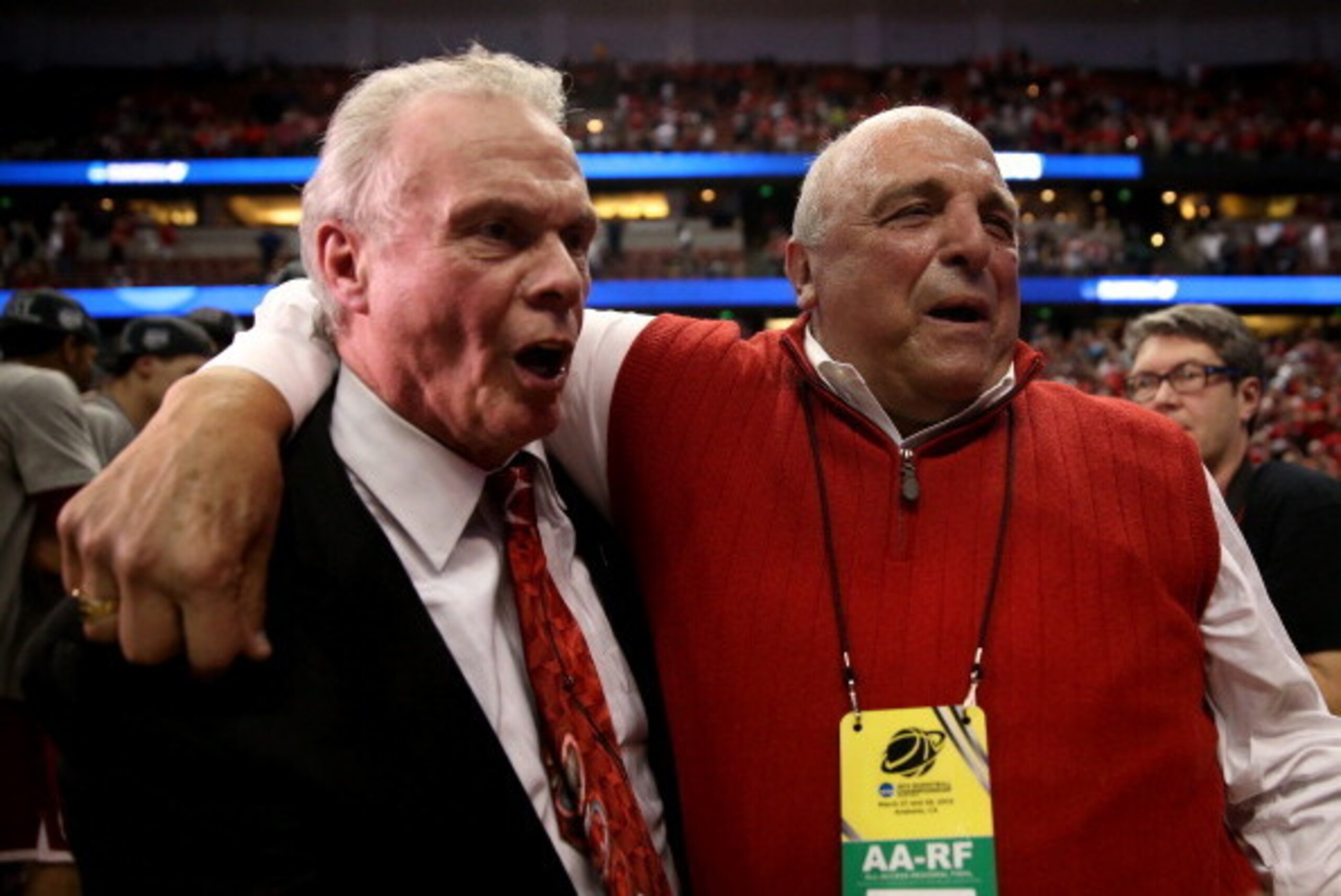 ANAHEIM, CA - MARCH 29:  Head coach Bo Ryan of the Wisconsin Badgers celebrates with Director of Athletics Barry Alvarez after defeating the Arizona Wildcats 64-63 in overtime during the West Regional Final of the 2014 NCAA Men's Basketball Tournament at 