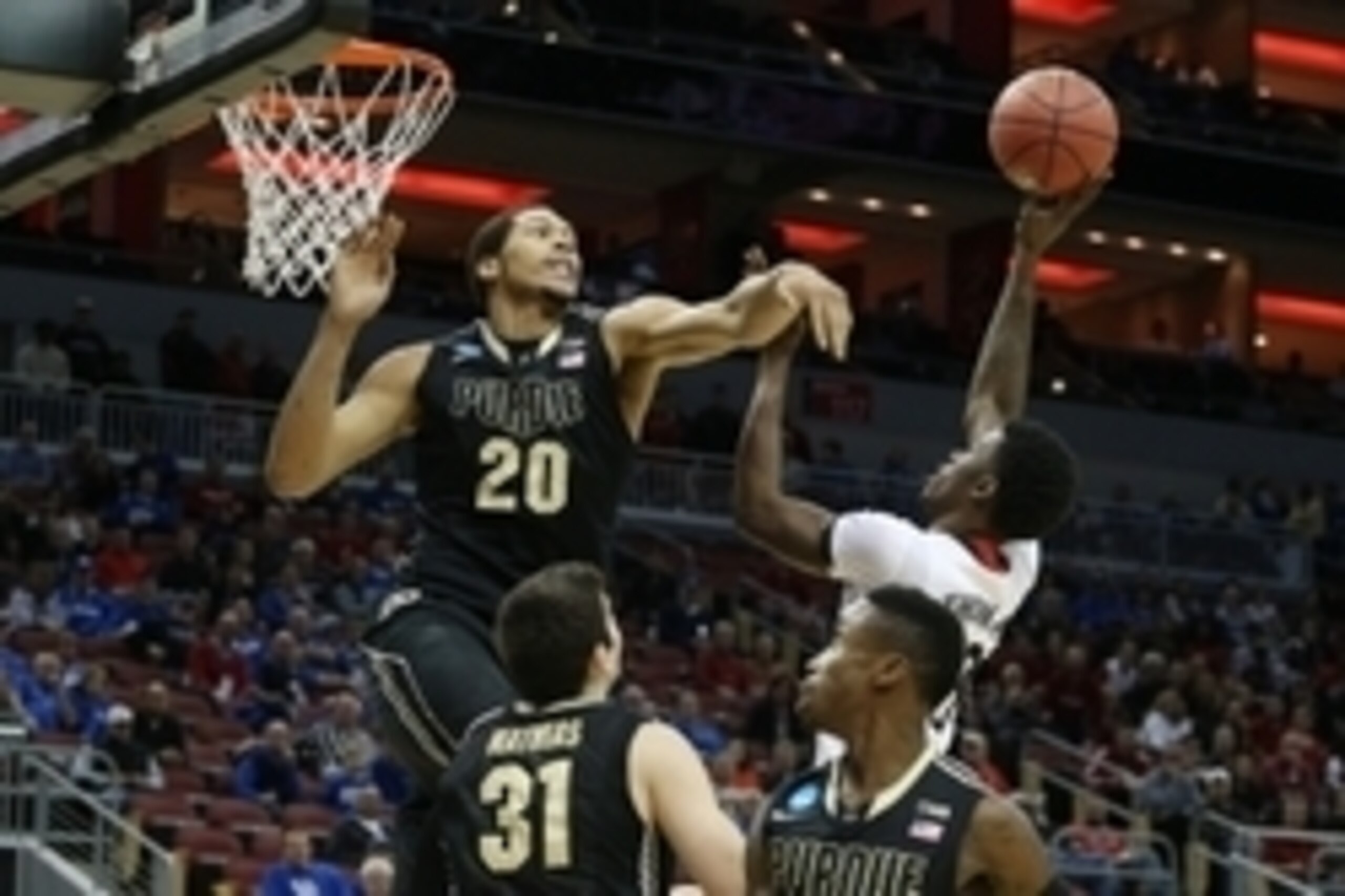 Mar 19, 2015; Louisville, KY, USA; Cincinnati Bearcats forward Shaquille Thomas (3) shoots the ball against Purdue Boilermakers center A.J. Hammons (20) during the first half in the second round of the 2015 NCAA Tournament at KFC Yum! Center. Mandatory Cr