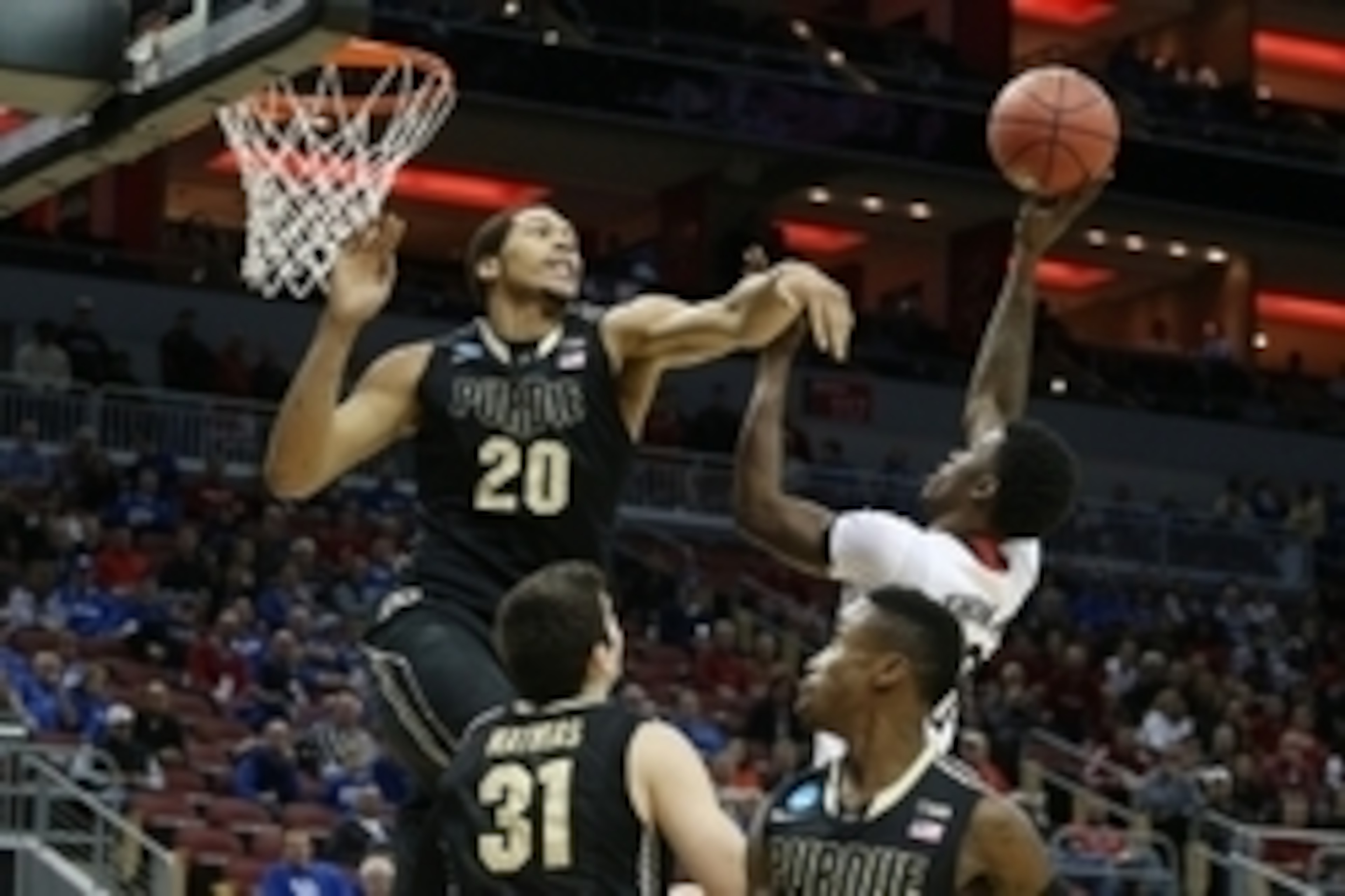 Mar 19, 2015; Louisville, KY, USA; Cincinnati Bearcats forward Shaquille Thomas (3) shoots the ball against Purdue Boilermakers center A.J. Hammons (20) during the first half in the second round of the 2015 NCAA Tournament at KFC Yum! Center. Mandatory Cr