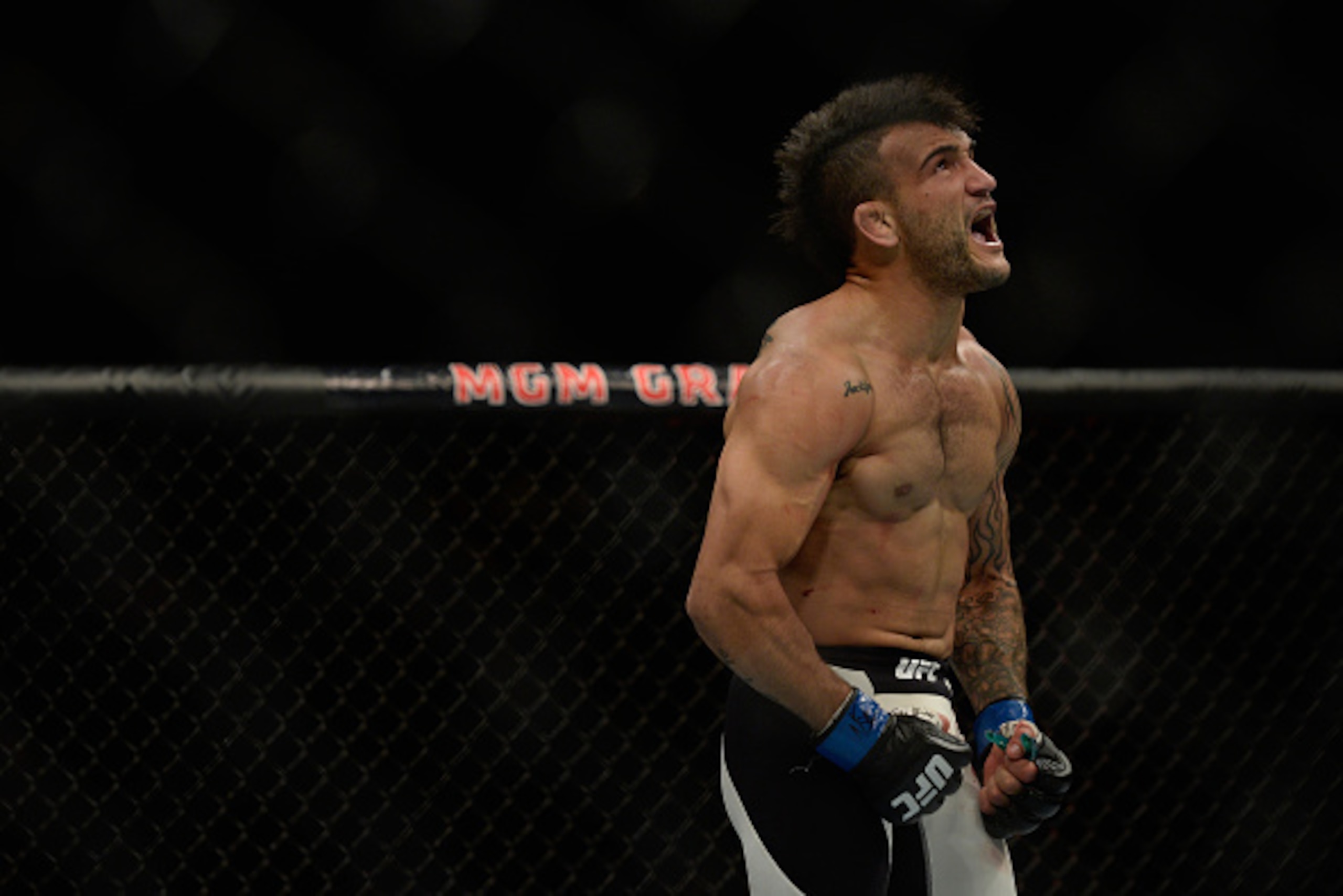 LAS VEGAS, NV - SEPTEMBER 05: John Lineker reacts to his victory over Francisco Rivera in their bantamweight bout during the UFC 191 event inside MGM Grand Garden Arena on September 5, 2015 in Las Vegas, Nevada.  (Photo by Brandon Magnus/Zuffa LLC/Zuffa L