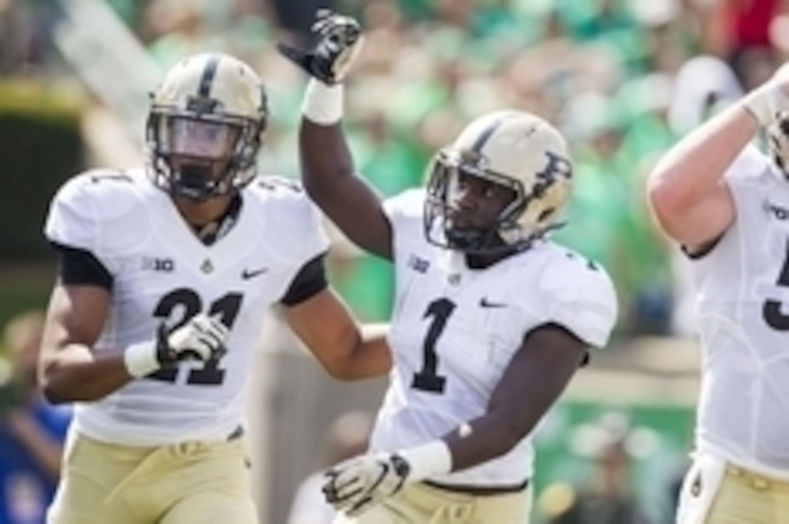 Sep 6, 2015; Huntington, WV, USA; Purdue Boilermakers running back D.J. Knox (1) celebrates with wide receiver Anthony Mahoungou after scoring during the first quarter at Joan C. Edwards Stadium.  Mandatory Credit: Ben Queen-USA TODAY Sports
