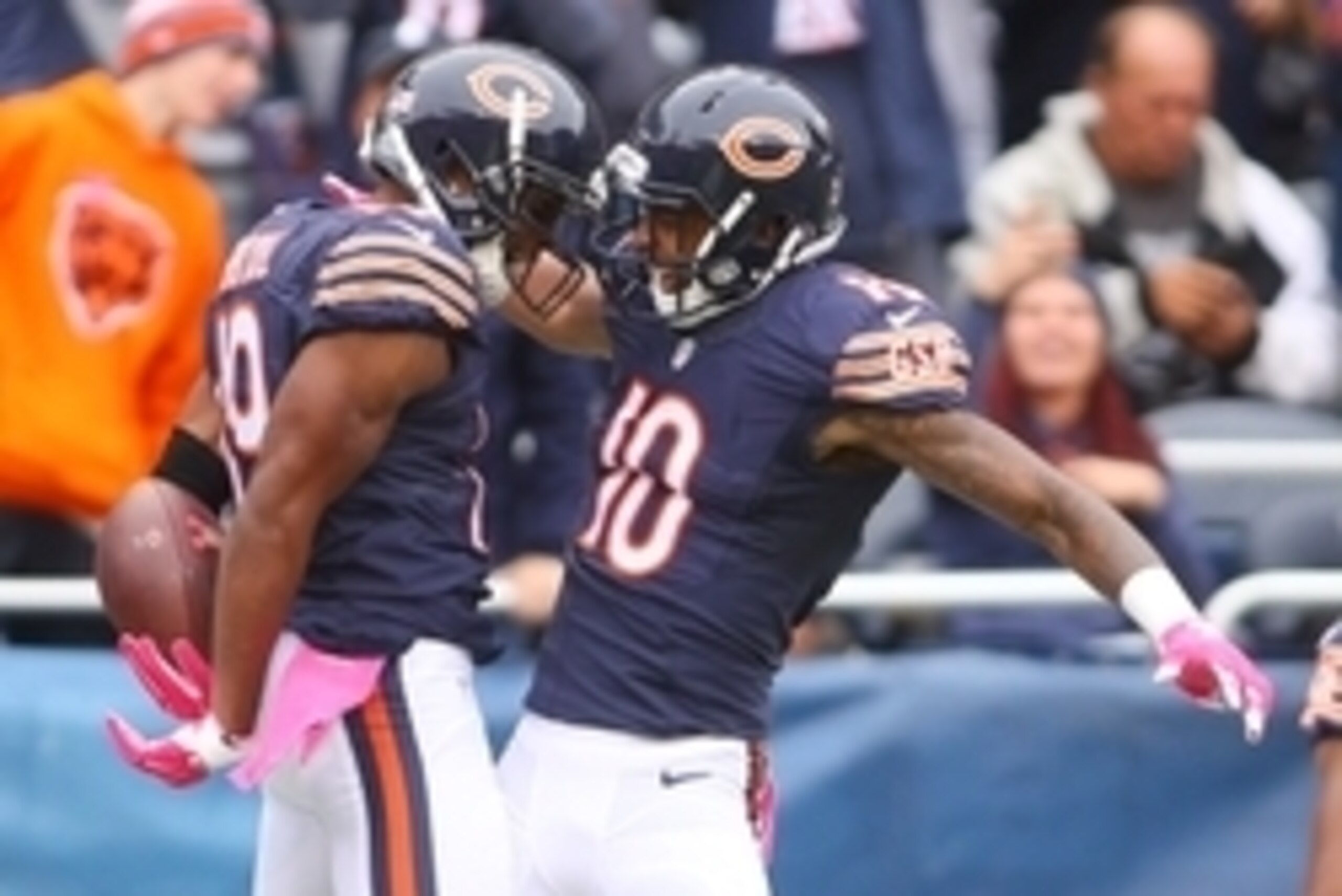 Oct 4, 2015; Chicago, IL, USA; Chicago Bears wide receiver Eddie Royal (19) celebrates with wide receiver Marquess Wilson (10) after scoring a touchdown against the Oakland Raiders during the first quarter at Soldier Field. Mandatory Credit: Jerry Lai-USA
