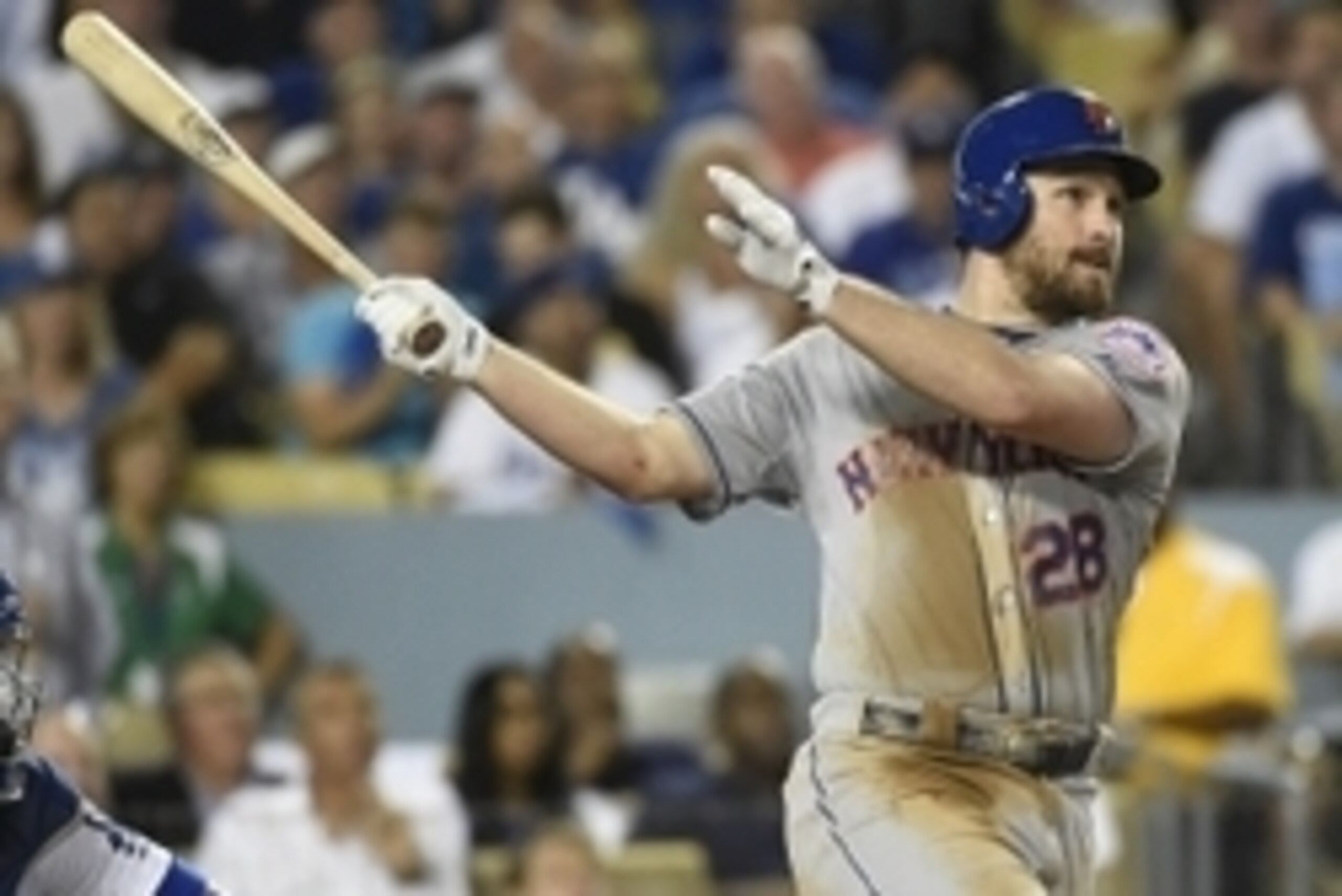 October 15, 2015; Los Angeles, CA, USA; New York Mets second baseman Daniel Murphy (28) hits a solo home run in the sixth inning against Los Angeles Dodgers in game five of NLDS at Dodger Stadium. Mandatory Credit: Richard Mackson-USA TODAY Sports