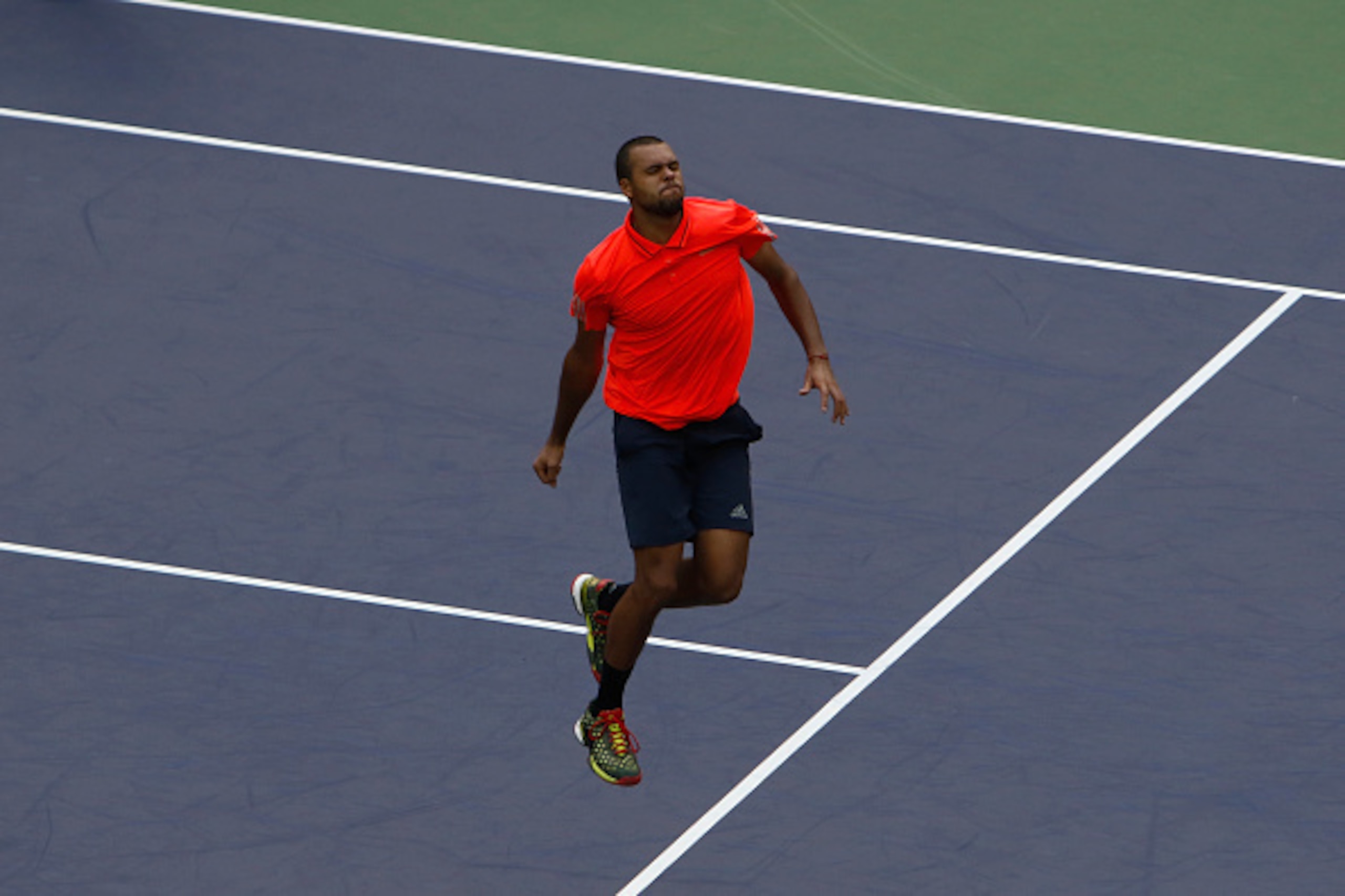 SHANGHAI, CHINA - OCTOBER 16:  Jo-Wilfried Tsonga of France celebrates after winning the match against Kevin Anderson of South Africa during the men's singles quarterfinals match on day 6 of Shanghai Rolex Masters at Qi Zhong Tennis Centre on October 16, 