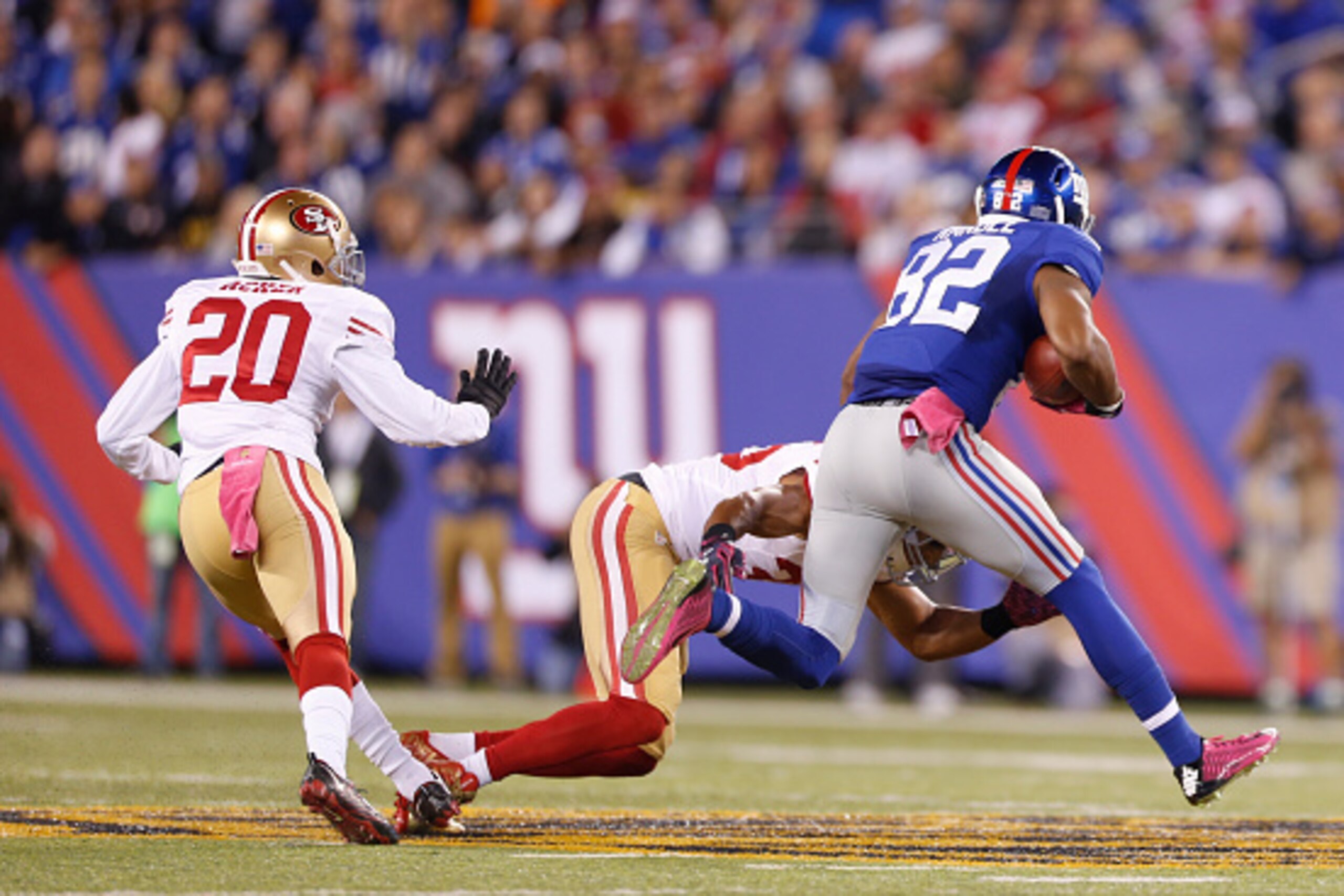 EAST RUTHERFORD, NJ - OCTOBER 11: Eric Reid #35 of the San Francisco 49ers tackles Odell Beckham Jr. #13 of the New York Giants during the game at MetLife Stadium on October 11, 2015 in East Rutherford, New Jersey. The Giants defeated the 49ers 30-27. (Ph EAST RUTHERFORD, NJ - OCTOBER 11: Eric Reid #35 of the San Francisco 49ers tackles Odell Beckham Jr. #13 of the New York Giants during the game at MetLife Stadium on October 11, 2015 in East Rutherford, New Jersey. The Giants defeated the 49ers 30-27. (Ph