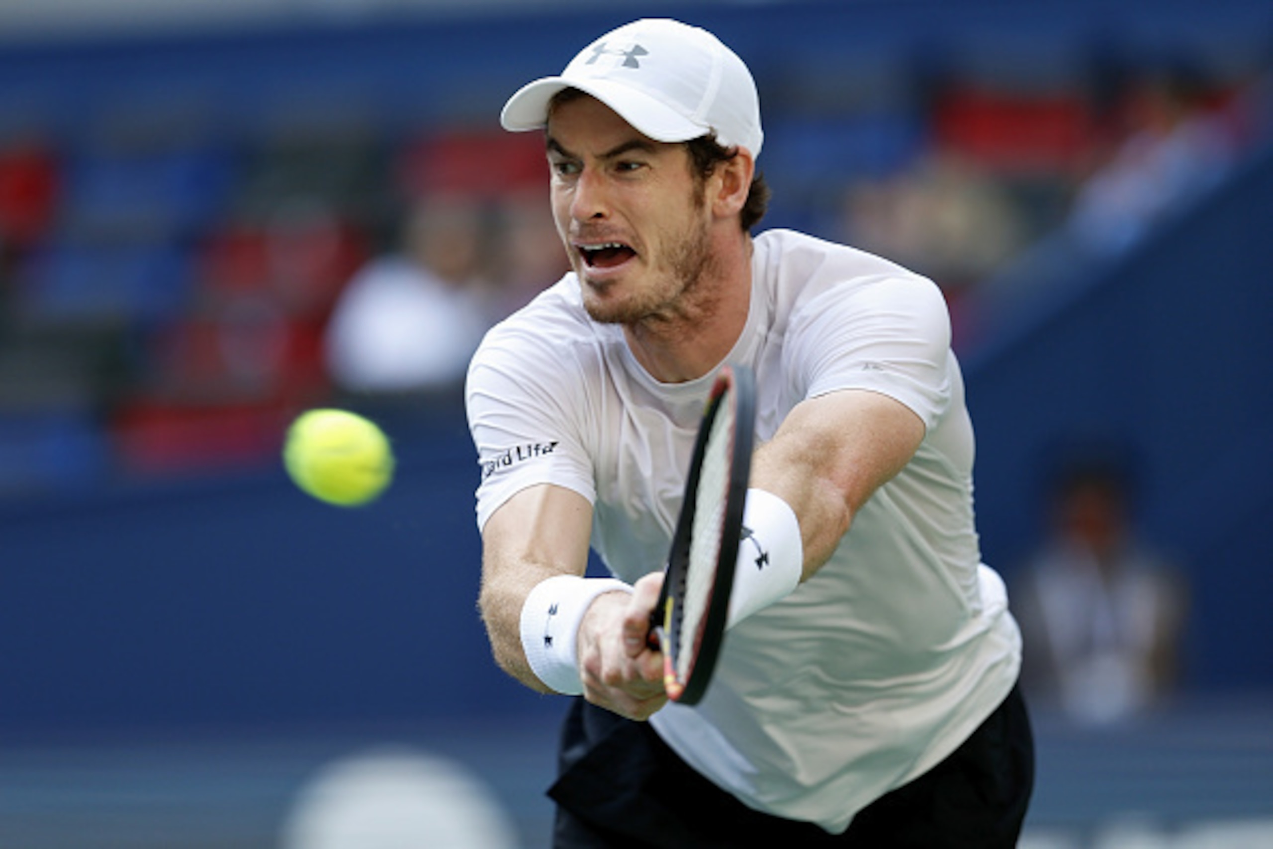 SHANGHAI, CHINA - OCTOBER 15:  Andy Murray of Great Britain returns a shot against John Isner of the United States  during the men's singles third round match on day 5 of Shanghai Rolex Masters at Qi Zhong Tennis Centre on October 15, 2015 in Shanghai, Ch