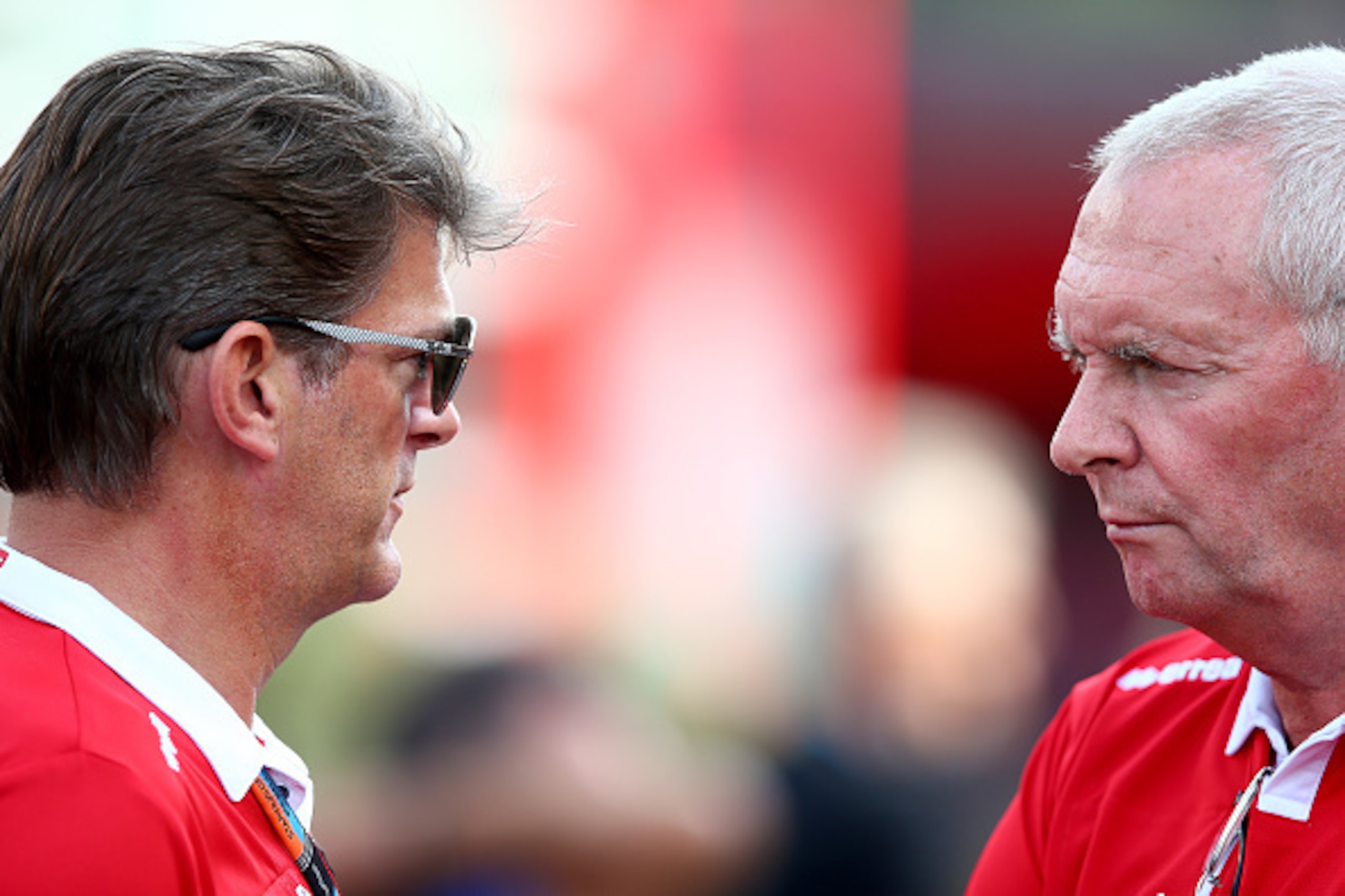 MONZA, ITALY - SEPTEMBER 04:  Manor Marussia President and Sporting Director Graeme Lowdon speaks with Manor Marussia Team Principal John Booth in the paddock after practice for the Formula One Grand Prix of Italy at Autodromo di Monza on September 4, 201