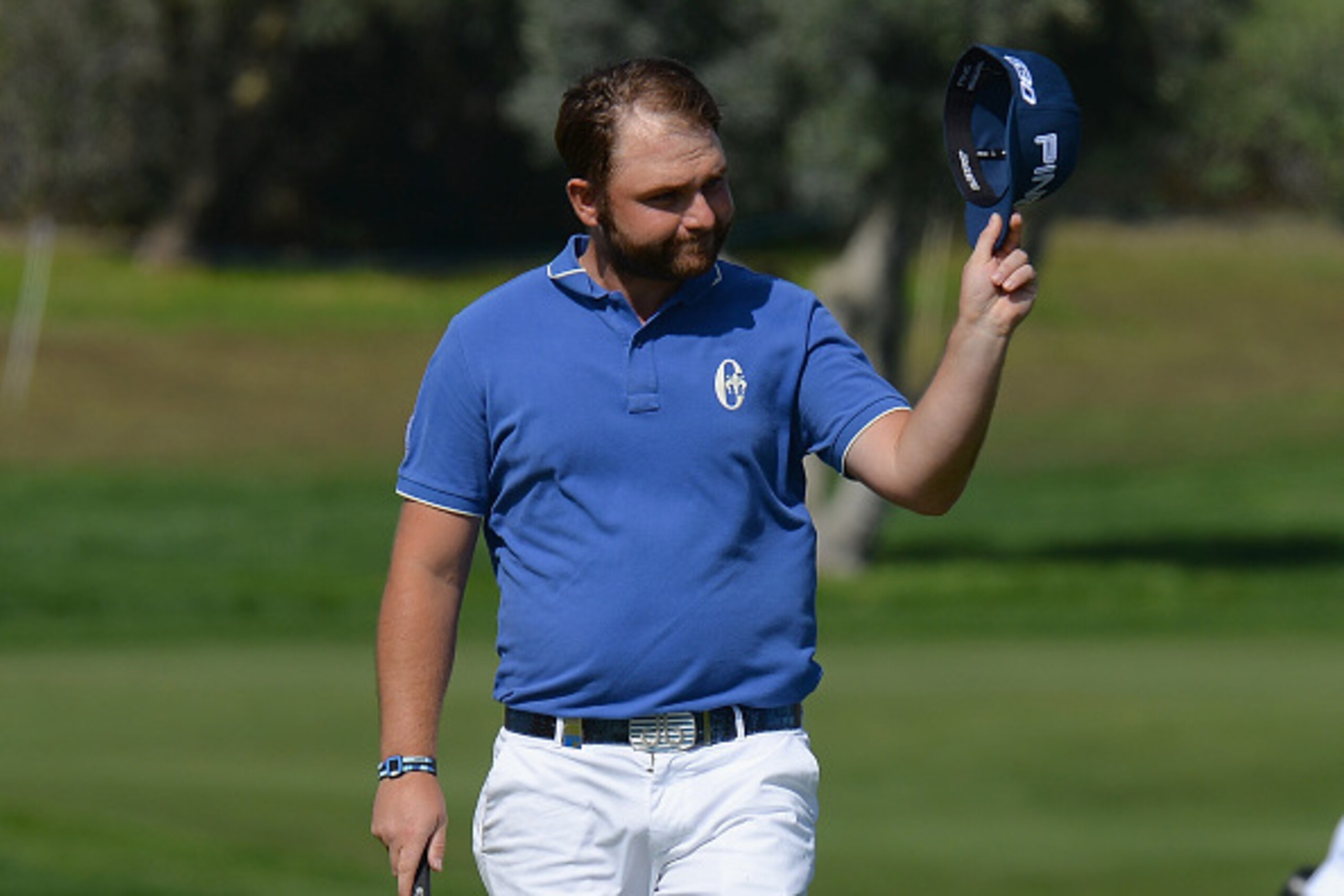 ALBUFEIRA, PORTUGAL - OCTOBER 16:  Andy Sullivan of England acknowledges the applause from the gallery on the 9th green during the second day of the Portugal Masters at Oceanico Victoria Golf Club on October 16, 2015 in Albufeira, Portugal.  (Photo by Ton