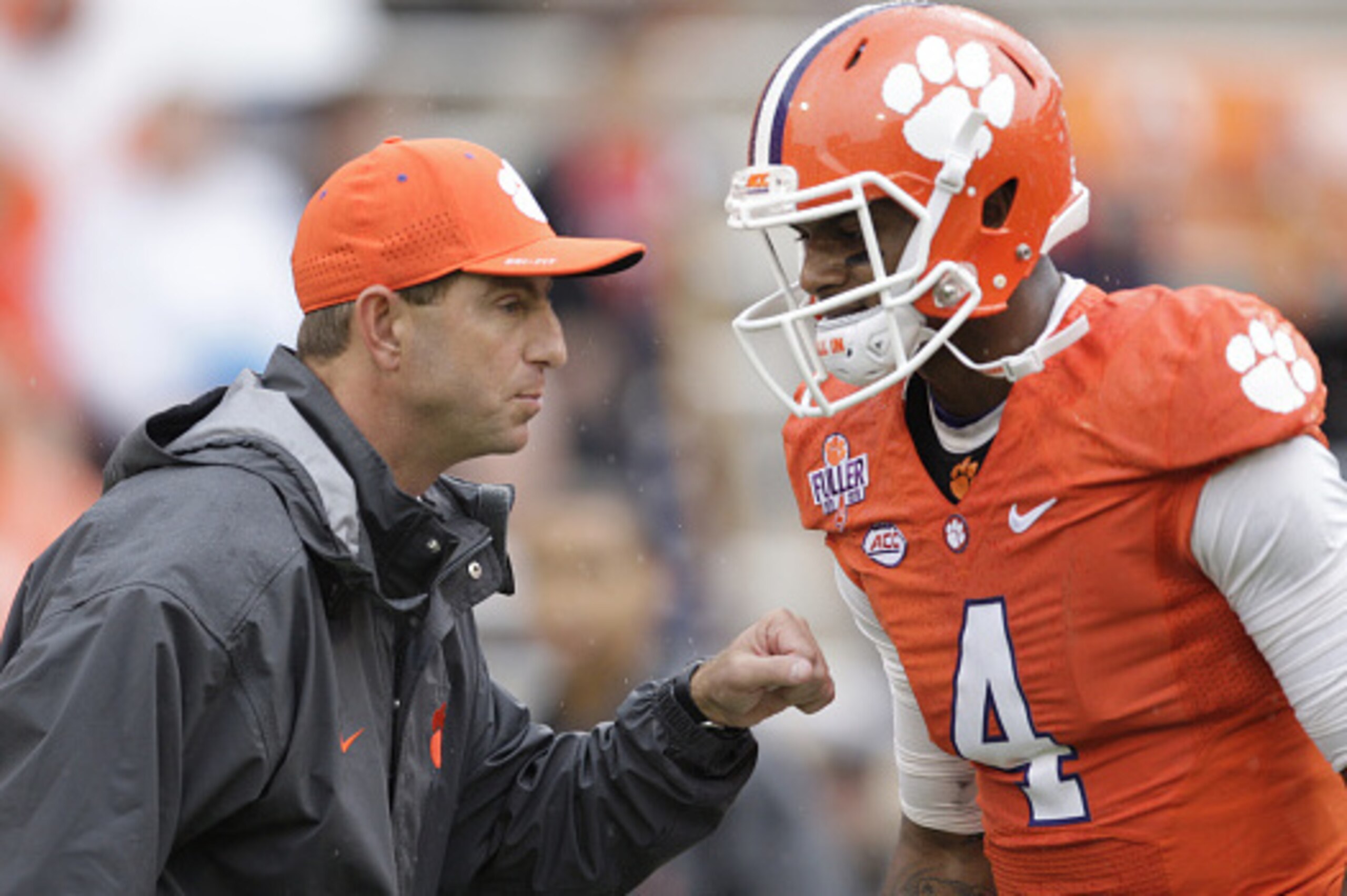 CLEMSON, SC - OCTOBER 10: Head Coach Dabo Swinney of the Clemson Tigers talks with quarterback Deshaun Watson #4 prior to their game against the Georgia Tech Yellow Jackets at Memorial Stadium on October 10, 2015 in Clemson, South Carolina. (Photo by Tyle CLEMSON, SC - OCTOBER 10: Head Coach Dabo Swinney of the Clemson Tigers talks with quarterback Deshaun Watson #4 prior to their game against the Georgia Tech Yellow Jackets at Memorial Stadium on October 10, 2015 in Clemson, South Carolina. (Photo by Tyle