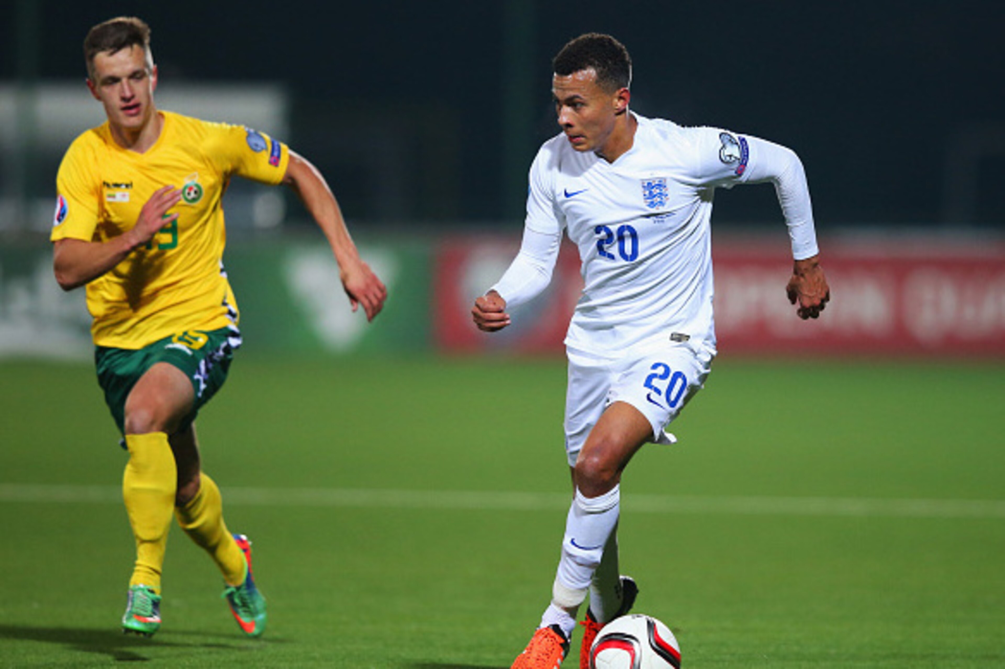 KAUNAS, LITHUANIA - OCTOBER 12: Dele Alli of England is chased by Deimantas Petravicius of Lithuania during the UEFA EURO 2016 qualifying Group E match between Lithuania and England at LFF Stadionas on October 12, 2015 in Kaunas, Lithuania. (Photo by Al KAUNAS, LITHUANIA - OCTOBER 12: Dele Alli of England is chased by Deimantas Petravicius of Lithuania during the UEFA EURO 2016 qualifying Group E match between Lithuania and England at LFF Stadionas on October 12, 2015 in Kaunas, Lithuania. (Photo by Al