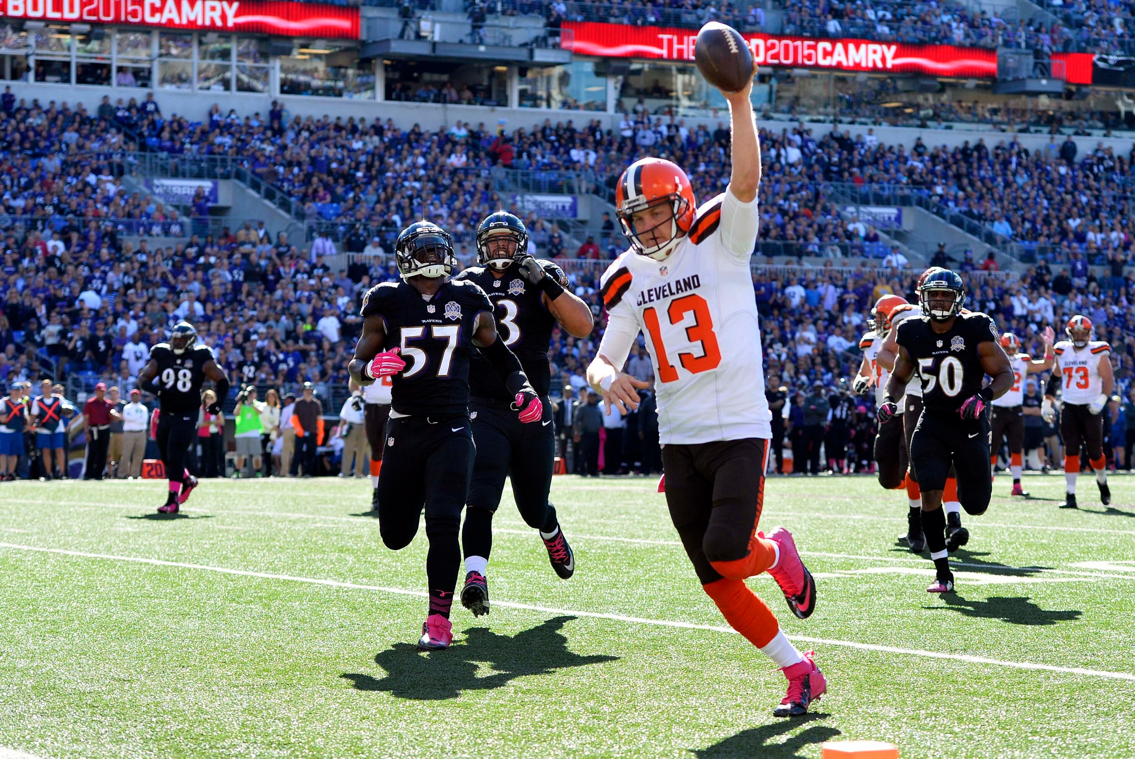 Oct 11, 2015; Baltimore, MD, USA; Cleveland Browns quarterback Josh McCown (13) celebrates as he run in for a touchdown during the third quarter against the Baltimore Ravens at M&T Bank Stadium. Mandatory Credit: Tommy Gilligan-USA TODAY Sports
