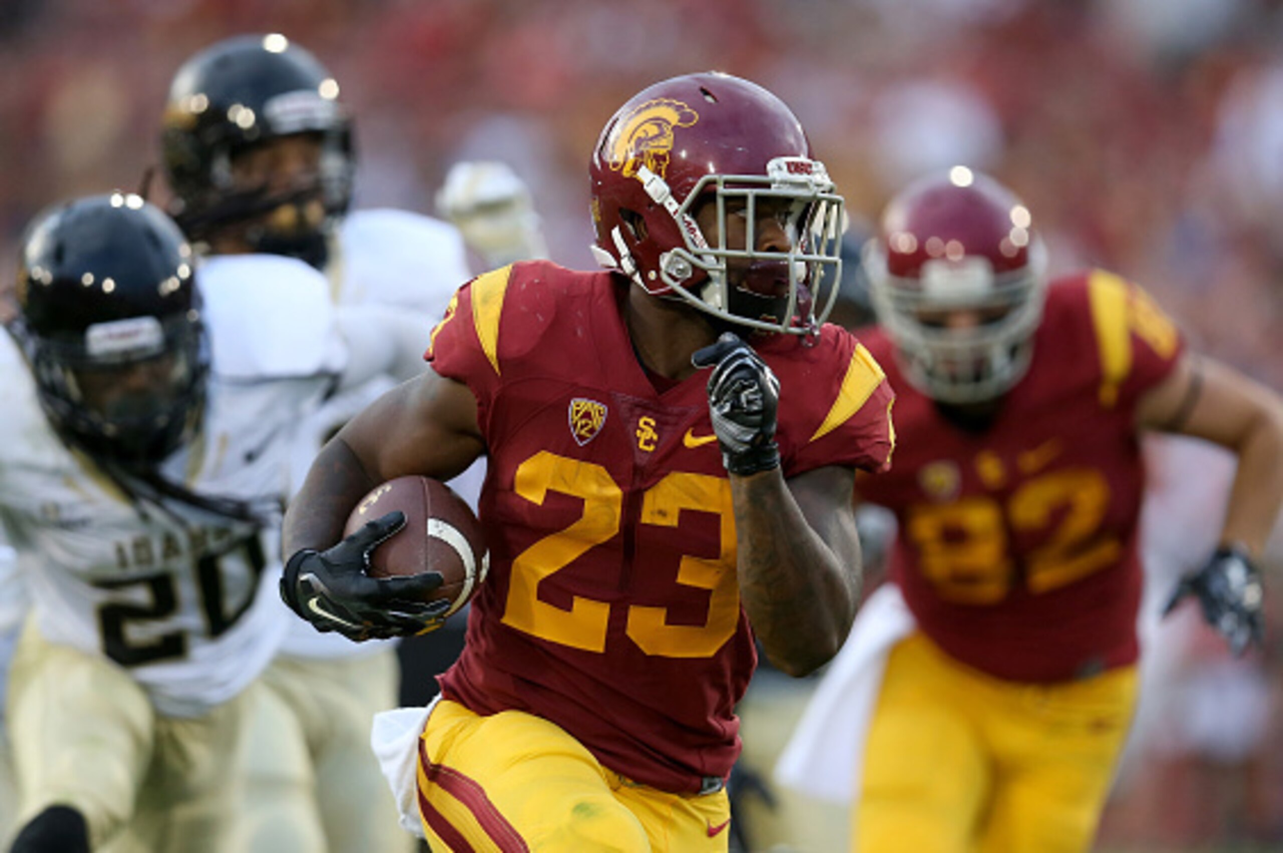 LOS ANGELES, CA - SEPTEMBER 12:  Running back Tre Madden #23 of the USC Trojans carries the ball against the Idaho Vandals at Los Angeles Memorial Coliseum on September 12, 2015 in Los Angeles, California. USC won 59-9.  (Photo by Stephen Dunn/Getty Image